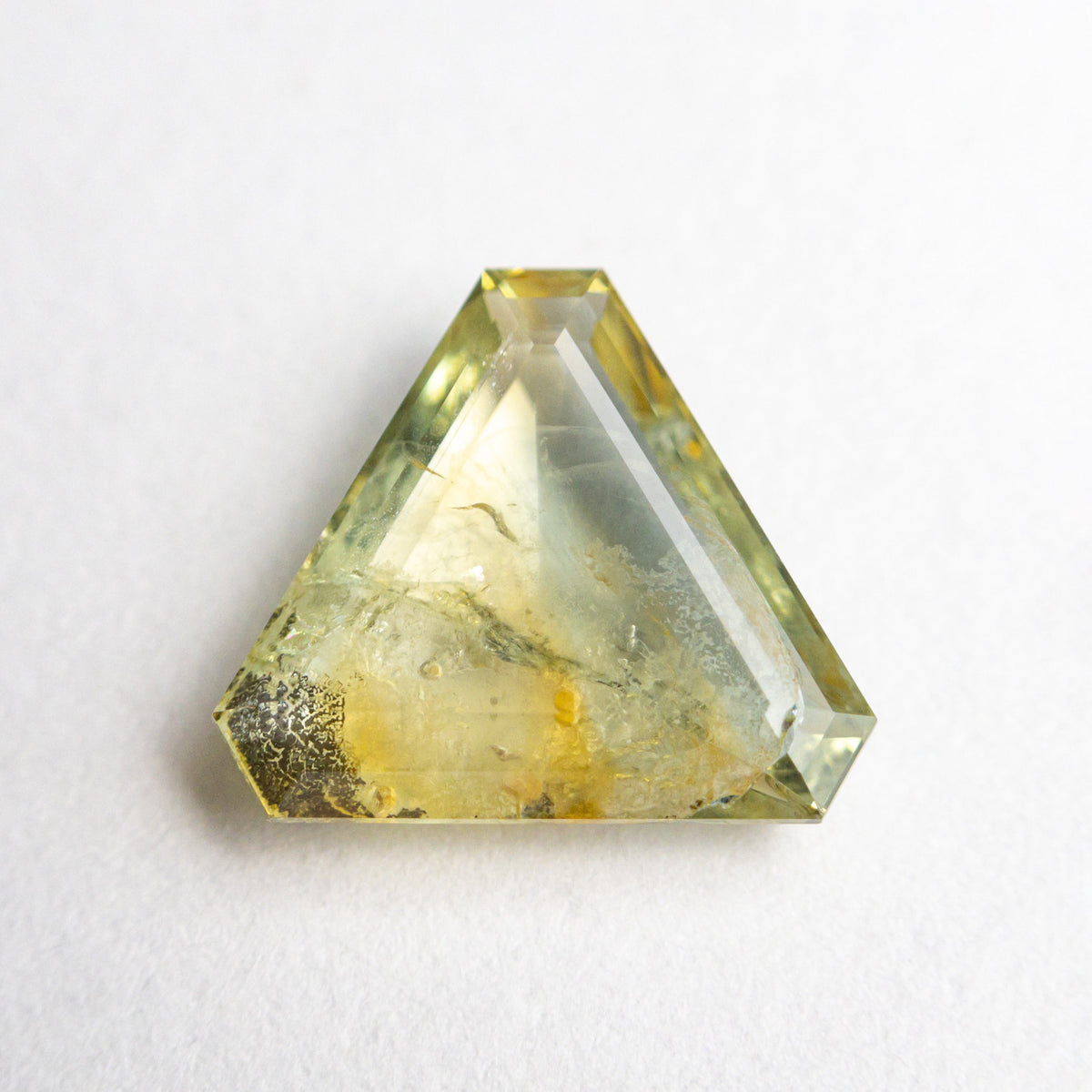 The 1.99ct 8.35x9.64x2.72mm Cut Corner Triangle Rosecut Sapphire 22434-77 by East London jeweller Rachel Boston | Discover our collections of unique and timeless engagement rings, wedding rings, and modern fine jewellery.