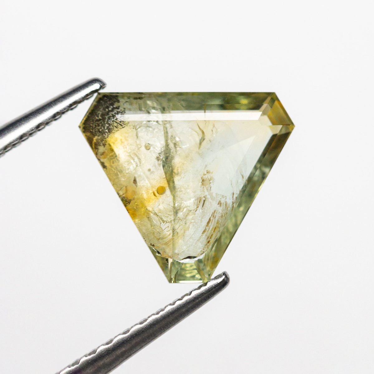 The 1.99ct 8.35x9.64x2.72mm Cut Corner Triangle Rosecut Sapphire 22434-77 by East London jeweller Rachel Boston | Discover our collections of unique and timeless engagement rings, wedding rings, and modern fine jewellery.