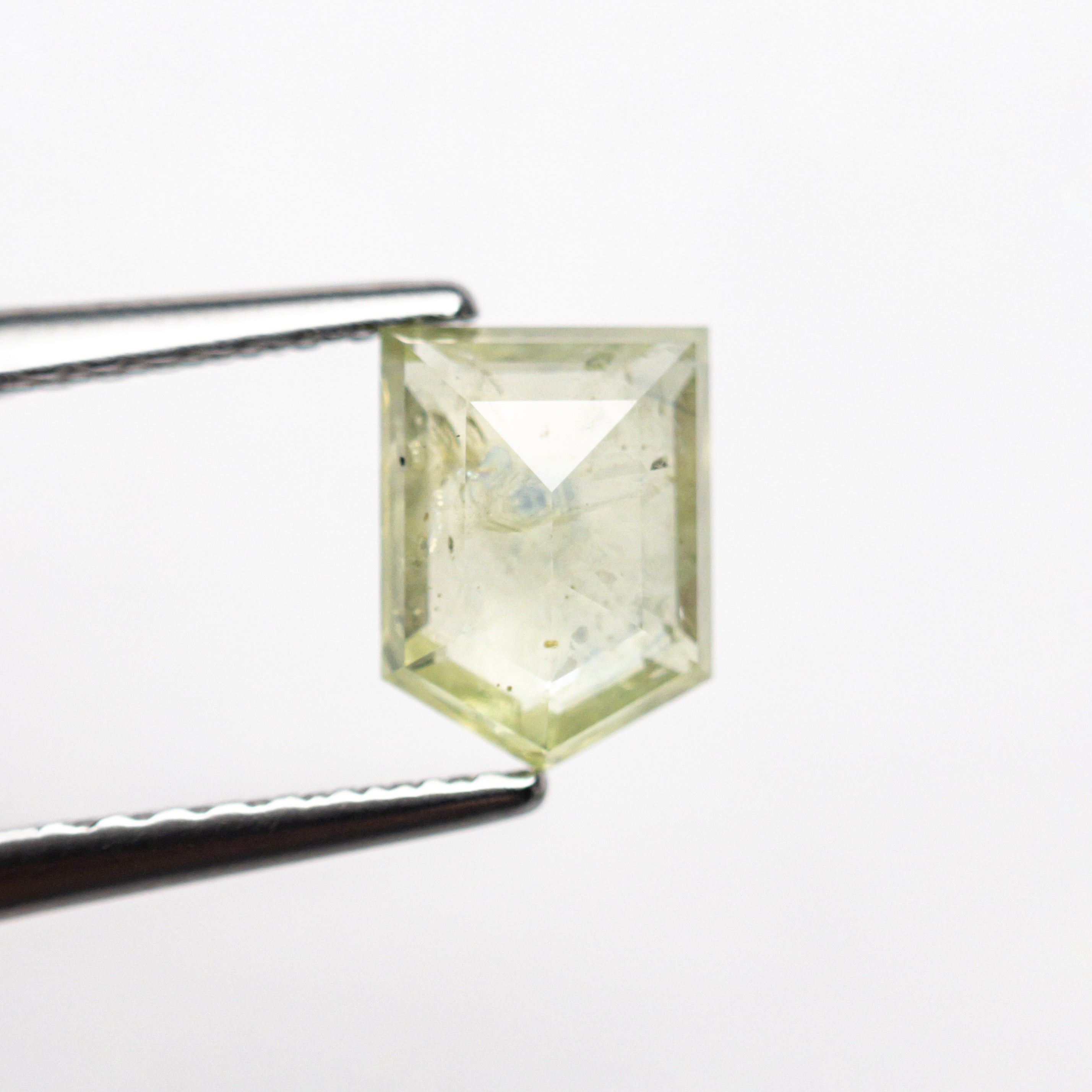 The 1.00ct 6.48x4.85x2.63mm Shield Double Cut Sapphire 22434-86 by East London jeweller Rachel Boston | Discover our collections of unique and timeless engagement rings, wedding rings, and modern fine jewellery.