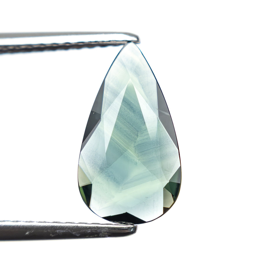 The 1.30ct 12.04x6.711.79mm Pear Rosecut Sapphire 22436-03 by East London jeweller Rachel Boston | Discover our collections of unique and timeless engagement rings, wedding rings, and modern fine jewellery. - Rachel Boston Jewellery
