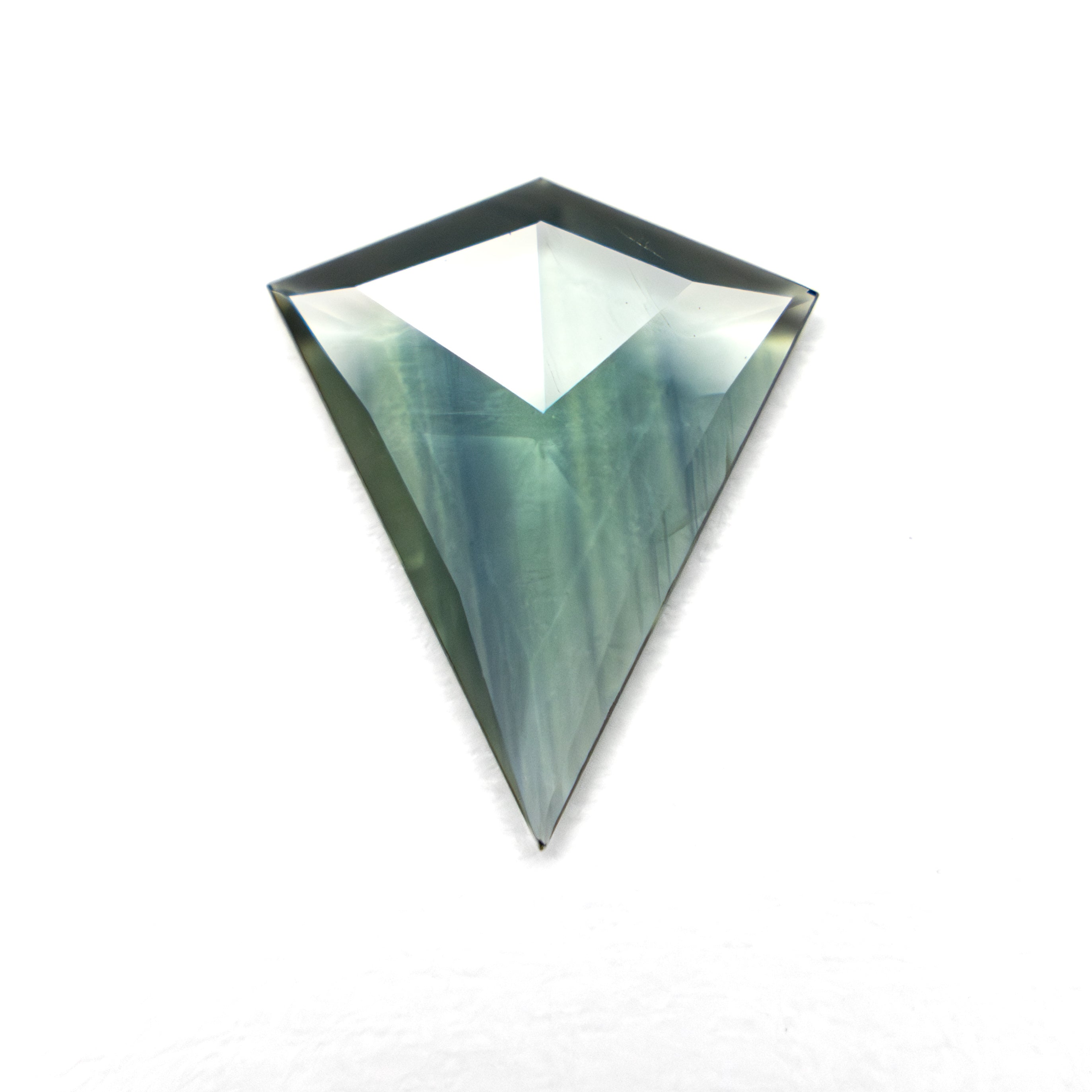 The 0.77ct 10.51x8.62x1.30mm Kite Rosecut Sapphire 22436-09 by East London jeweller Rachel Boston | Discover our collections of unique and timeless engagement rings, wedding rings, and modern fine jewellery.