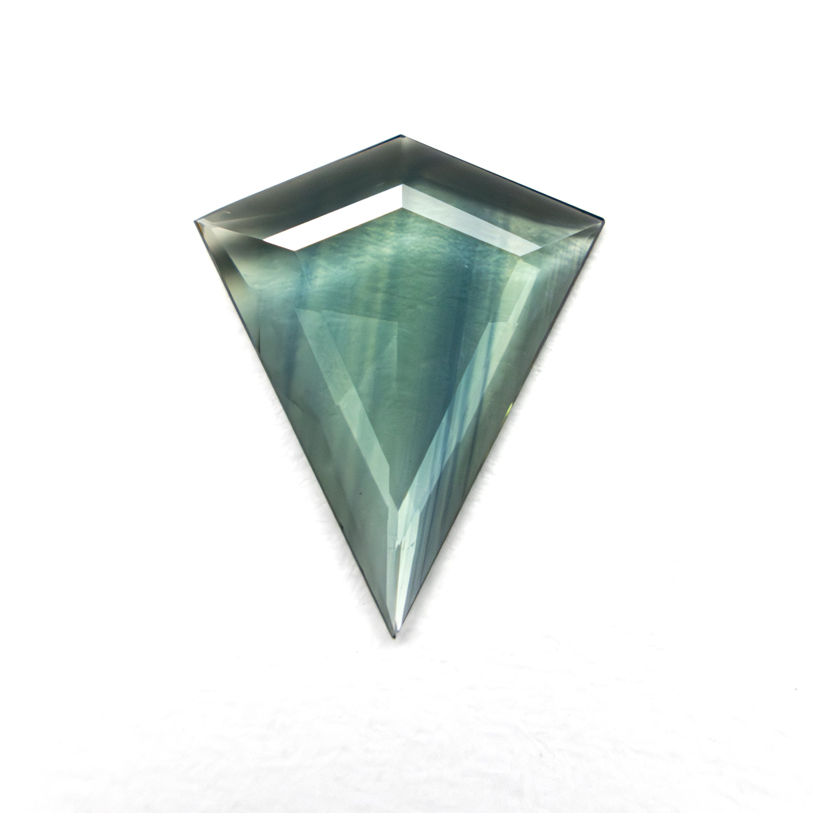The 0.77ct 10.51x8.62x1.30mm Kite Rosecut Sapphire 22436-09 by East London jeweller Rachel Boston | Discover our collections of unique and timeless engagement rings, wedding rings, and modern fine jewellery.