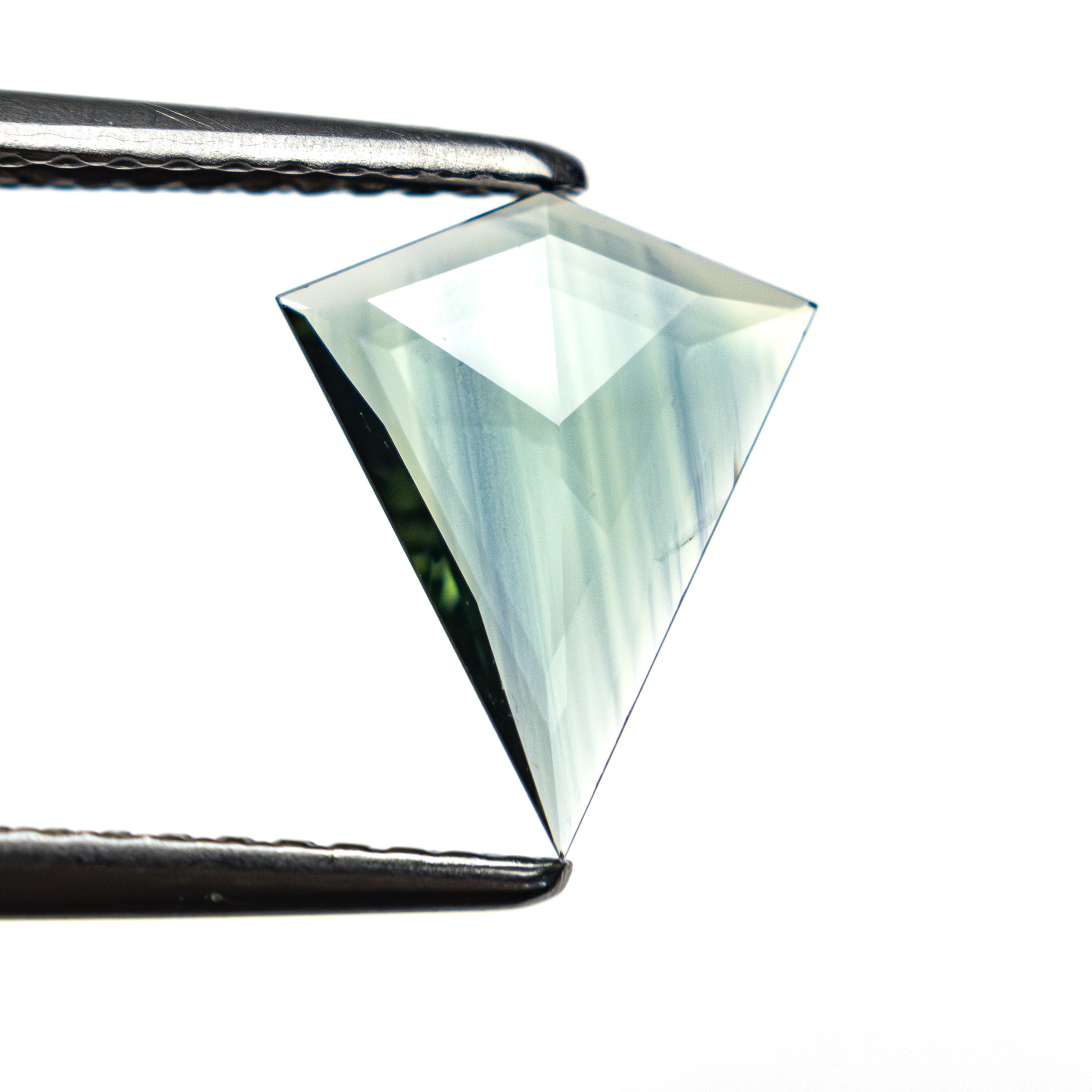 The 0.77ct 10.51x8.62x1.30mm Kite Rosecut Sapphire 22436-09 by East London jeweller Rachel Boston | Discover our collections of unique and timeless engagement rings, wedding rings, and modern fine jewellery.
