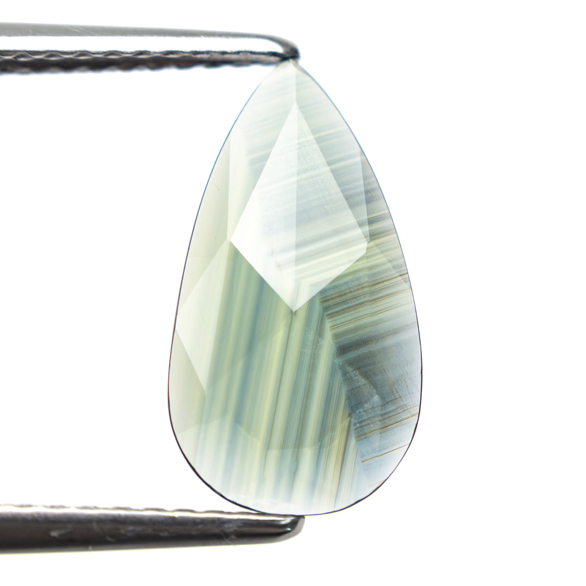 The 1.41ct 13.51x7.53x1.52mm Pear Rosecut Sapphire 22436-13 by East London jeweller Rachel Boston | Discover our collections of unique and timeless engagement rings, wedding rings, and modern fine jewellery.