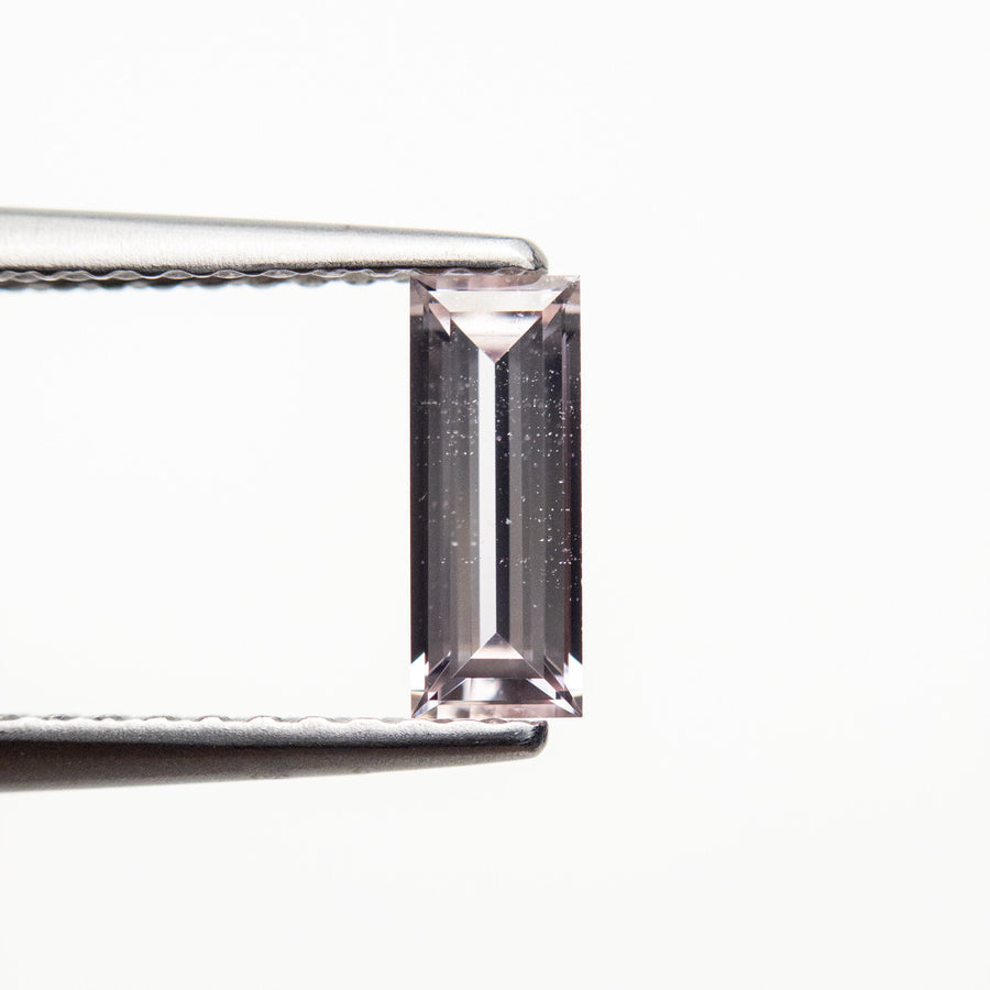 The 0.46ct 7.51x2.89x1.89mm Baguette Step Cut Sapphire 22848-01 by East London jeweller Rachel Boston | Discover our collections of unique and timeless engagement rings, wedding rings, and modern fine jewellery. - Rachel Boston Jewellery