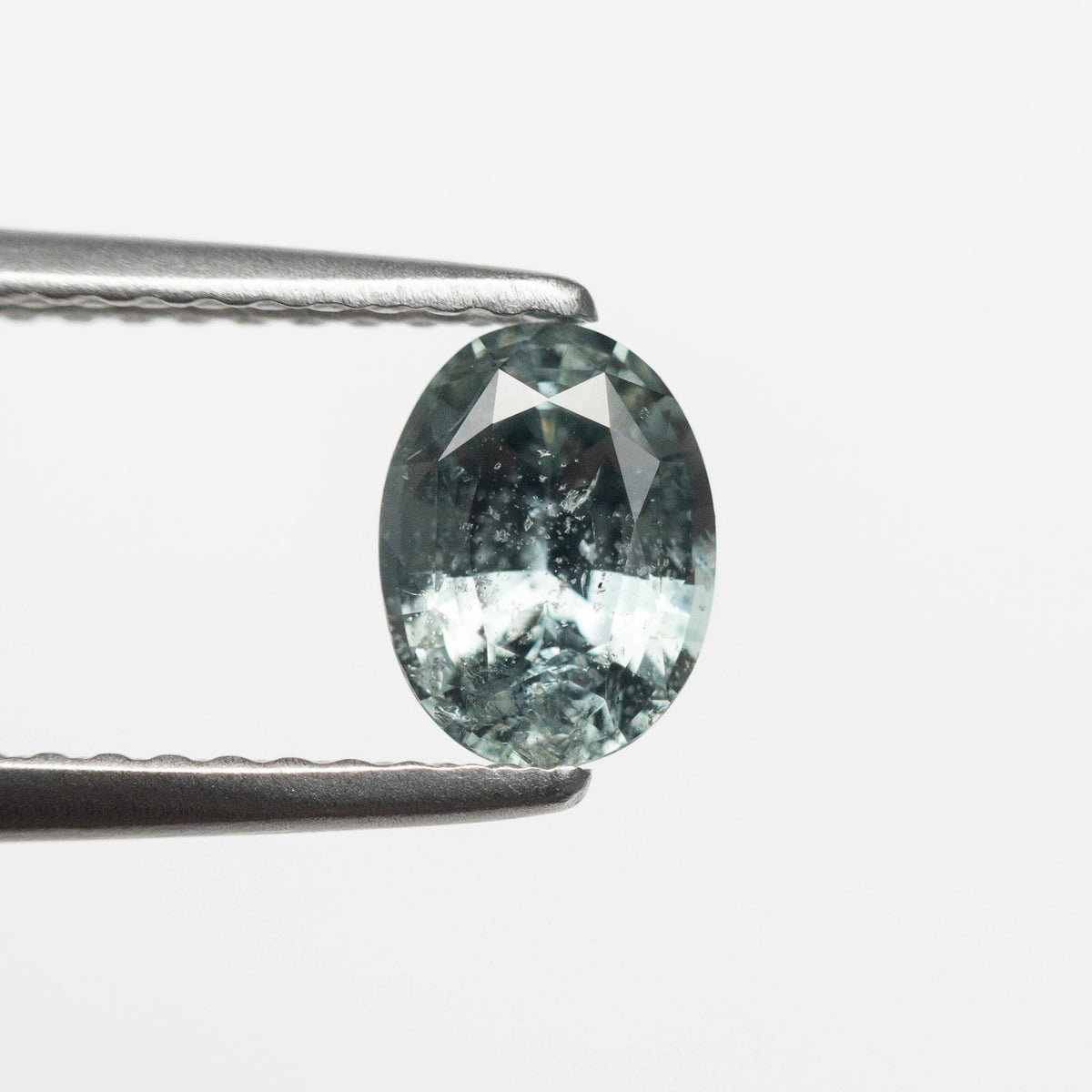 The 0.88ct 6.52x4.87x3.32mm Oval Brilliant Sapphire 23046-01 by East London jeweller Rachel Boston | Discover our collections of unique and timeless engagement rings, wedding rings, and modern fine jewellery.