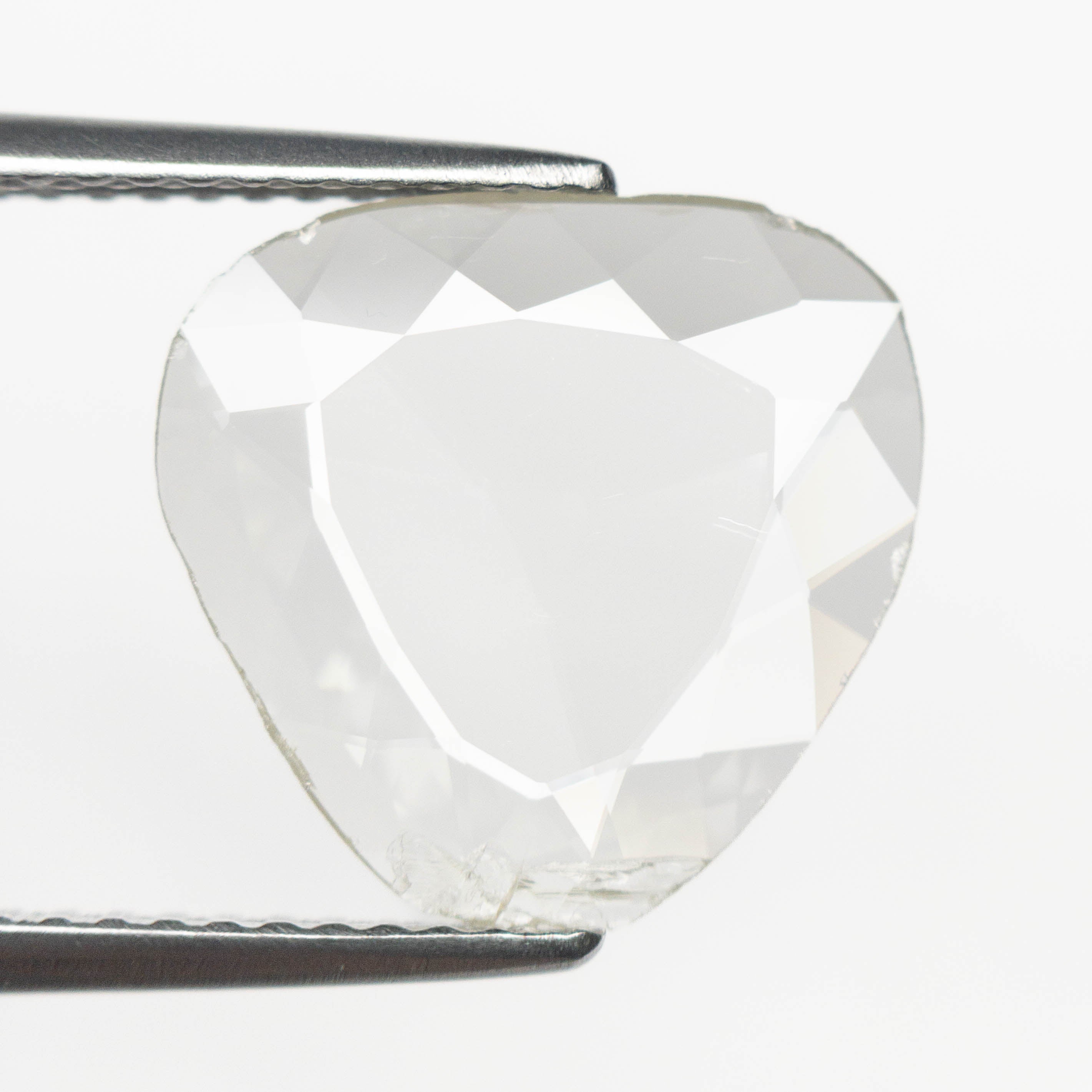 The 1.56ct 12.58x12.03x1.03mm SI1 O-P Antique Portrait Cut 23110-01 by East London jeweller Rachel Boston | Discover our collections of unique and timeless engagement rings, wedding rings, and modern fine jewellery.