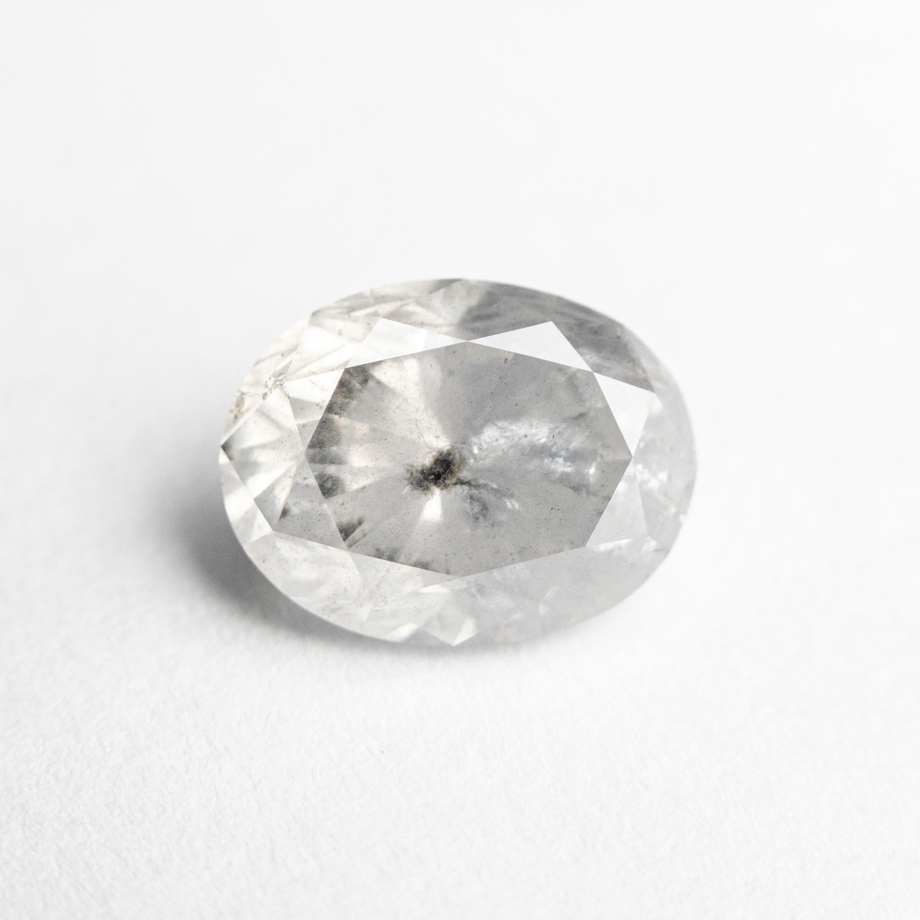 The 2.03ct 8.55x6.53x4.86mm Oval Brilliant 23182-05 by East London jeweller Rachel Boston | Discover our collections of unique and timeless engagement rings, wedding rings, and modern fine jewellery.