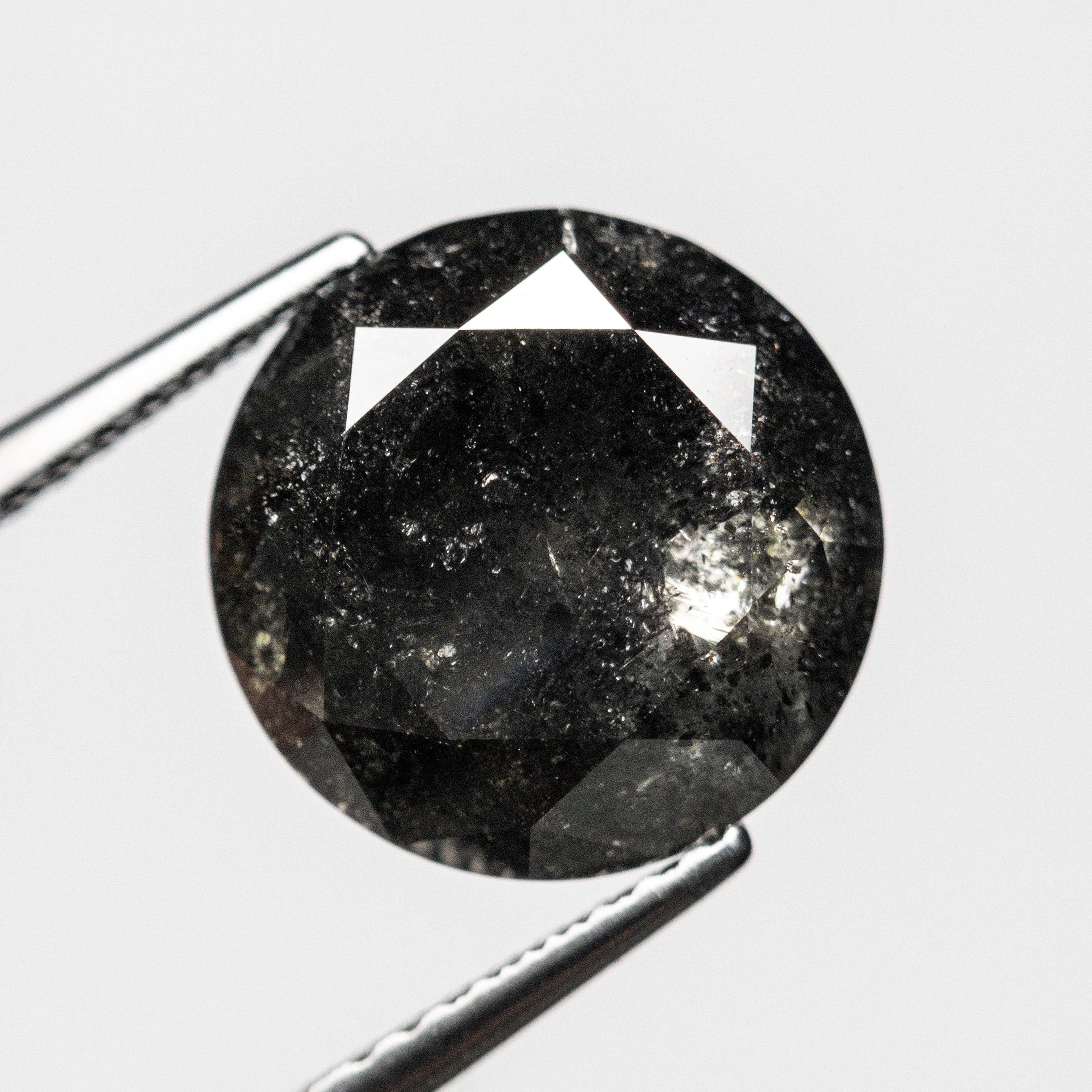 The 5.26ct 10.49x10.48x7.09mm Round Brilliant 23193-01 by East London jeweller Rachel Boston | Discover our collections of unique and timeless engagement rings, wedding rings, and modern fine jewellery.