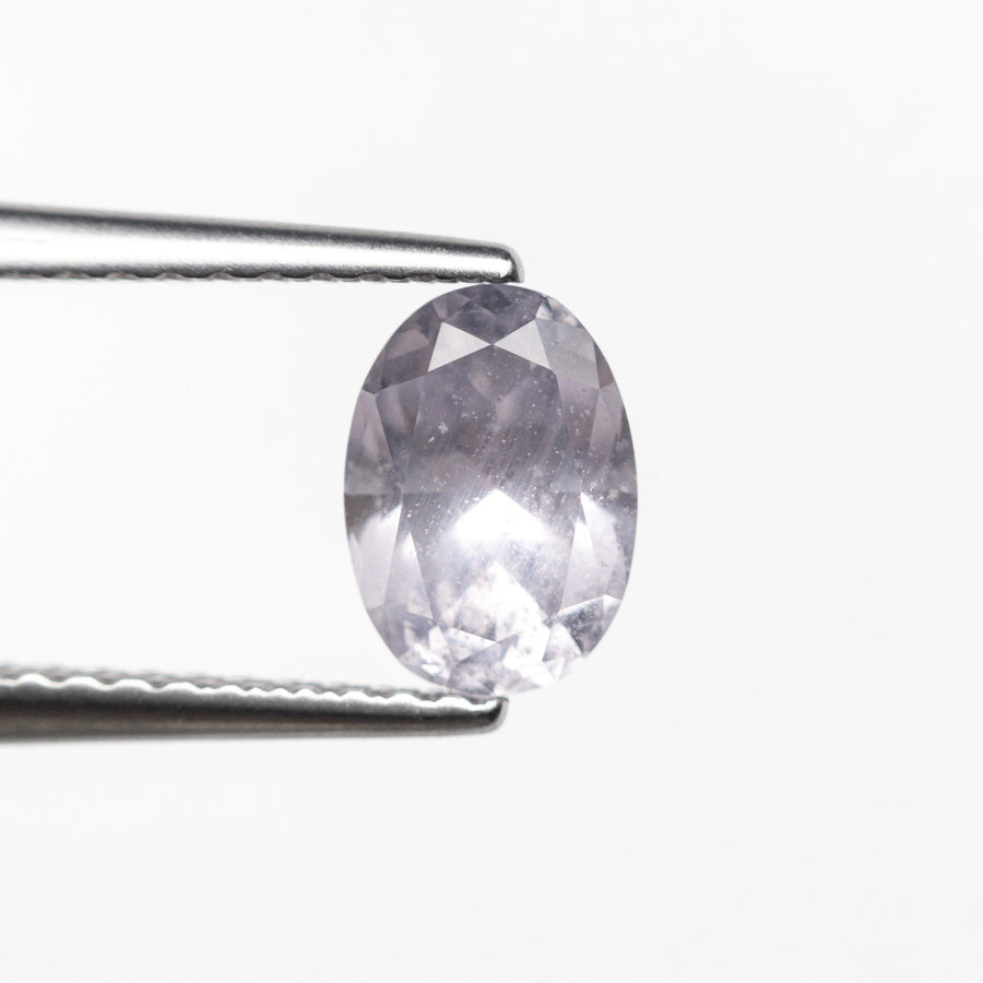 The 1.10ct 7.04x5.03x3.83mm Oval Brilliant Sapphire 23384-01 by East London jeweller Rachel Boston | Discover our collections of unique and timeless engagement rings, wedding rings, and modern fine jewellery. - Rachel Boston Jewellery