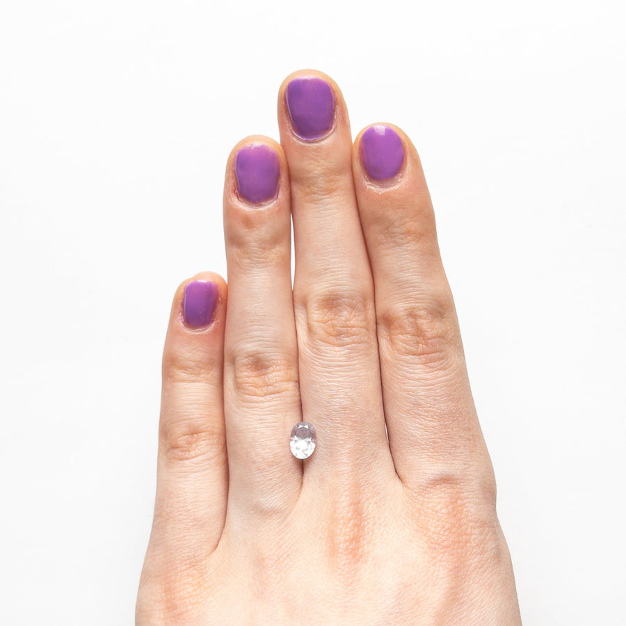 The 1.10ct 7.04x5.03x3.83mm Oval Brilliant Sapphire 23384-01 by East London jeweller Rachel Boston | Discover our collections of unique and timeless engagement rings, wedding rings, and modern fine jewellery. - Rachel Boston Jewellery