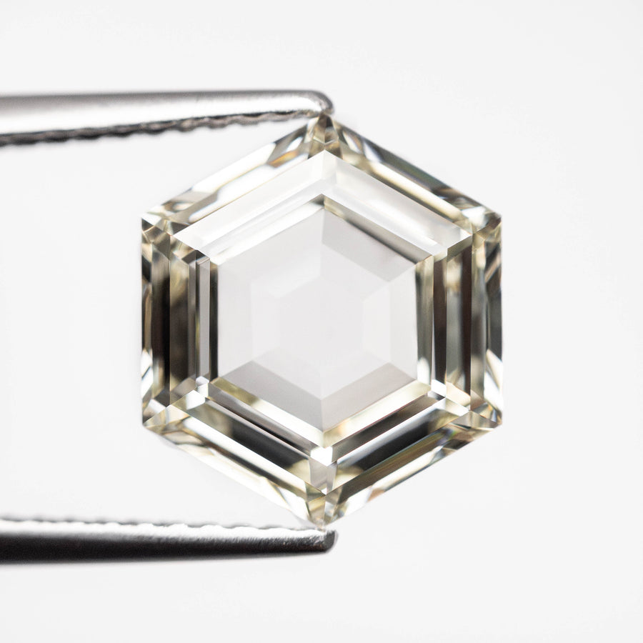 The 3.15ct 10.56x9.17x3.79mm GIA M VVS2 Hexagon Step Cut 23430-01 by East London jeweller Rachel Boston | Discover our collections of unique and timeless engagement rings, wedding rings, and modern fine jewellery. - Rachel Boston Jewellery