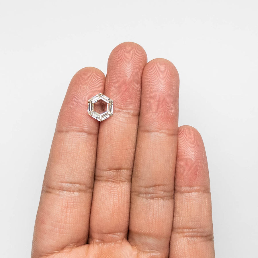 The 3.15ct 10.56x9.17x3.79mm GIA M VVS2 Hexagon Step Cut 23430-01 by East London jeweller Rachel Boston | Discover our collections of unique and timeless engagement rings, wedding rings, and modern fine jewellery. - Rachel Boston Jewellery