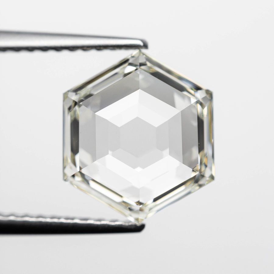 The 3.15ct 10.56x9.17x3.79mm GIA M VVS2 Hexagon Step Cut 23430-01 by East London jeweller Rachel Boston | Discover our collections of unique and timeless engagement rings, wedding rings, and modern fine jewellery. - Rachel Boston Jewellery