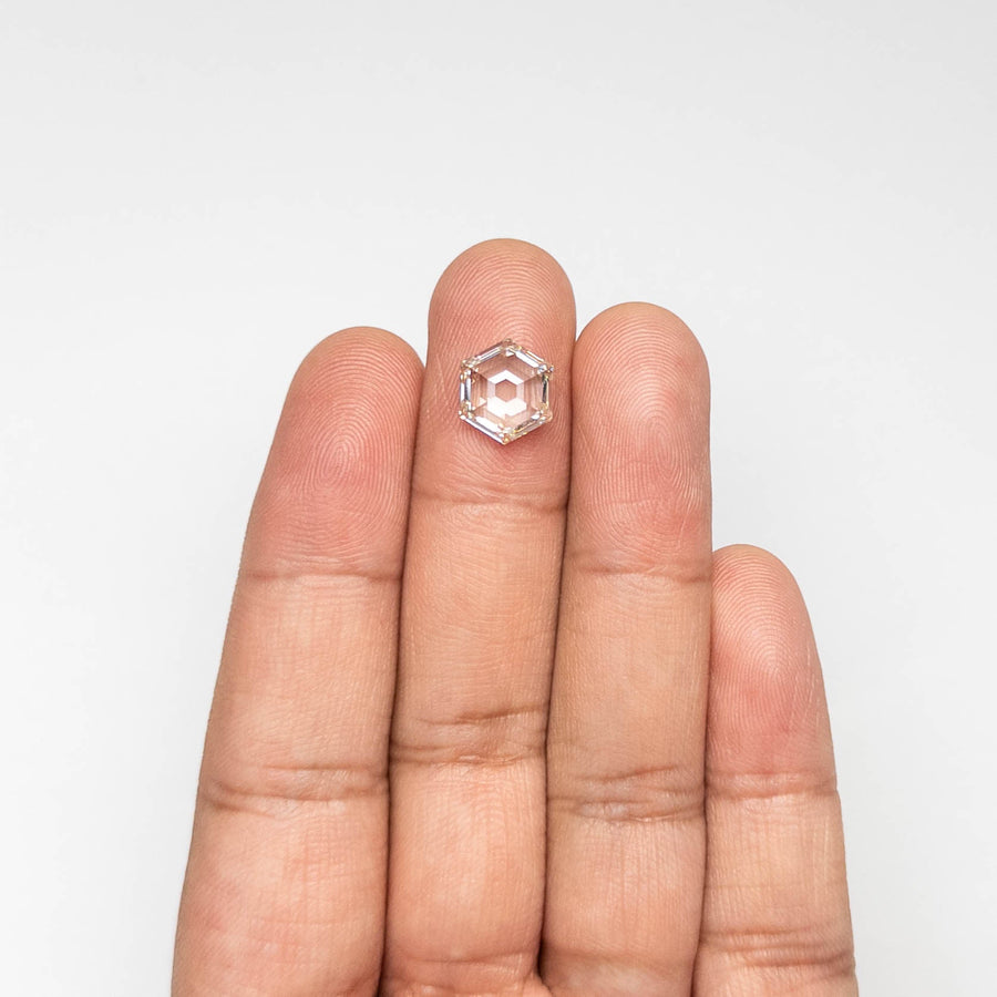 The 3.15ct 10.56x9.17x3.79mm GIA M VVS2 Hexagon Step Cut 23430-01 by East London jeweller Rachel Boston | Discover our collections of unique and timeless engagement rings, wedding rings, and modern fine jewellery. - Rachel Boston Jewellery