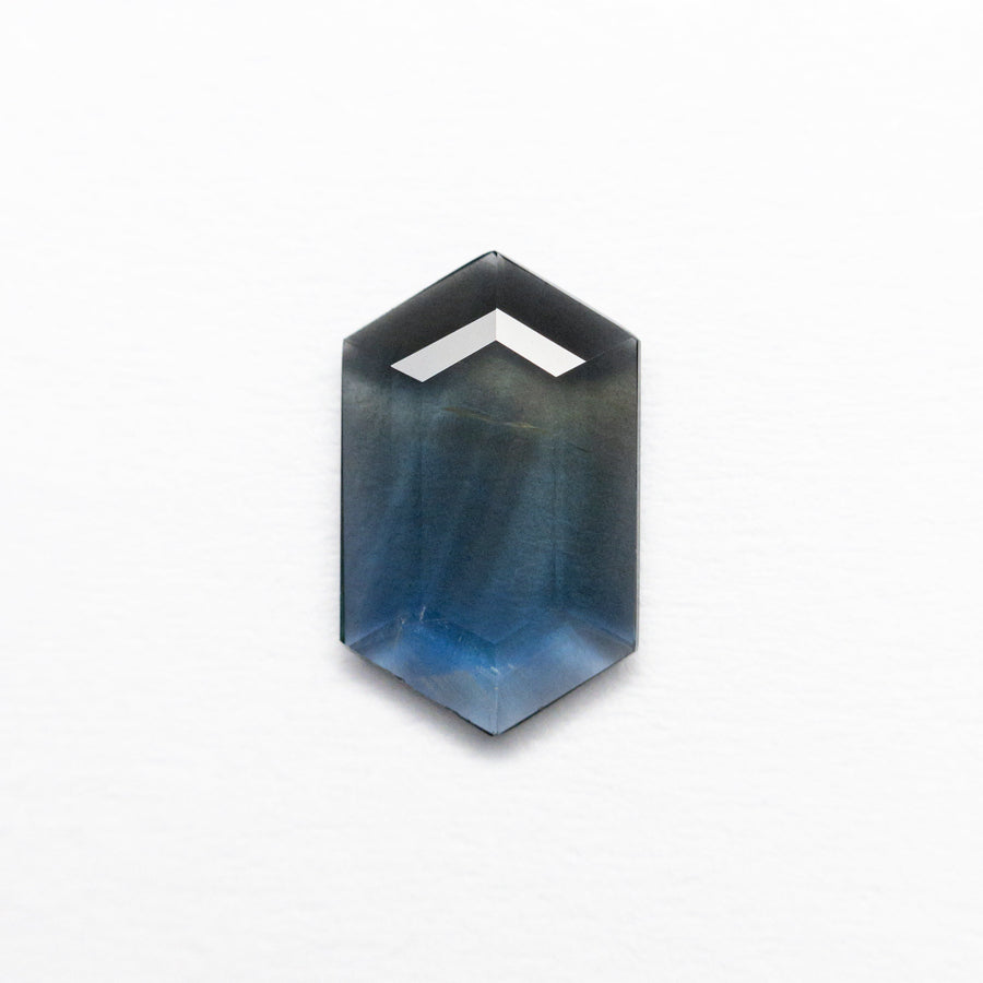 The 0.64ct 8.21x5.05x1.37mm Hexagon Portrait Cut Sapphire 23433-51 by East London jeweller Rachel Boston | Discover our collections of unique and timeless engagement rings, wedding rings, and modern fine jewellery. - Rachel Boston Jewellery