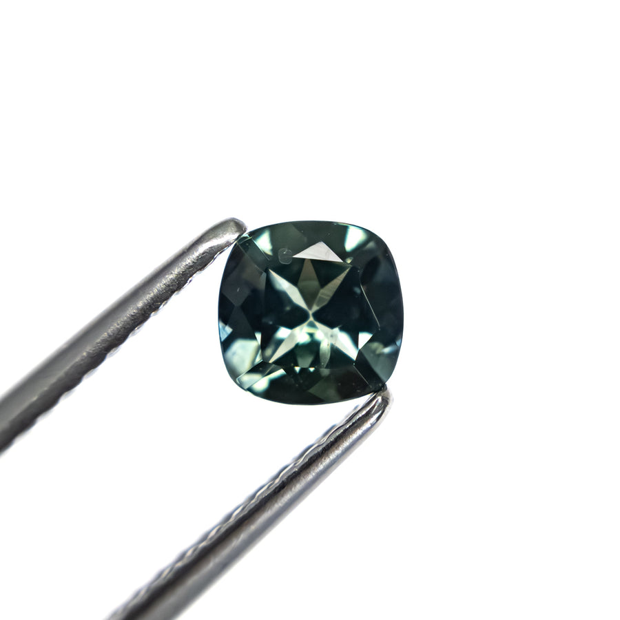 The 0.67ct 5.00x5.00x3.00mm Cushion Brilliant Sapphire 23466-11 by East London jeweller Rachel Boston | Discover our collections of unique and timeless engagement rings, wedding rings, and modern fine jewellery. - Rachel Boston Jewellery