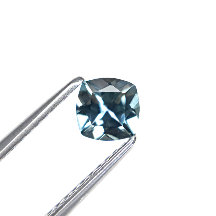 The 0.81ct 5.10x5.08x3.56mm Cushion Brilliant Sapphire 23466-14 by East London jeweller Rachel Boston | Discover our collections of unique and timeless engagement rings, wedding rings, and modern fine jewellery. - Rachel Boston Jewellery
