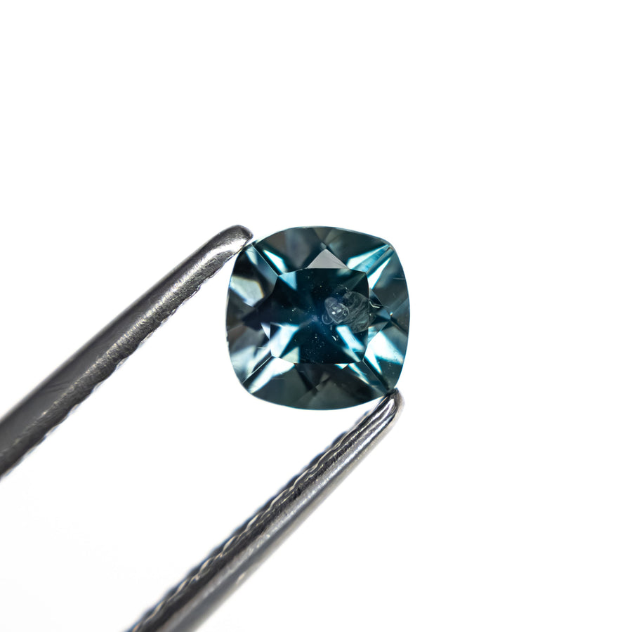 The 0.82ct 5.05x5.02x3.77mm Cushion Brilliant Sapphire 23466-15 by East London jeweller Rachel Boston | Discover our collections of unique and timeless engagement rings, wedding rings, and modern fine jewellery. - Rachel Boston Jewellery