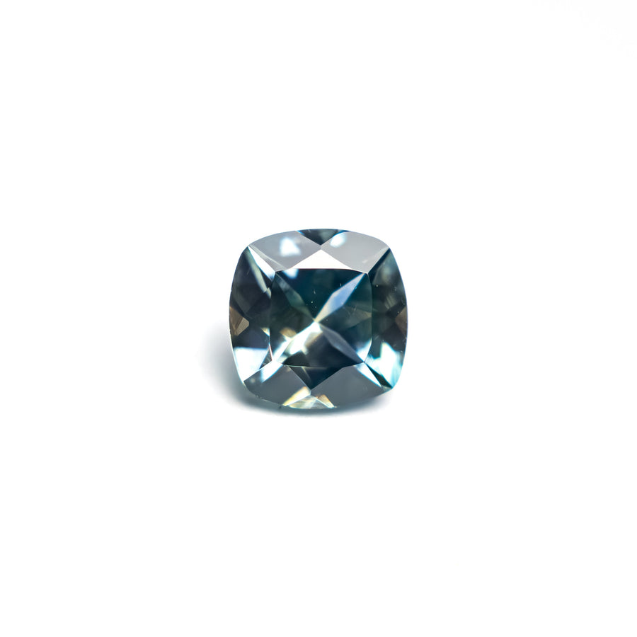 The 0.65ct 5.09x5.06x3.09mm Cushion Brilliant Sapphire 23466-17 by East London jeweller Rachel Boston | Discover our collections of unique and timeless engagement rings, wedding rings, and modern fine jewellery. - Rachel Boston Jewellery
