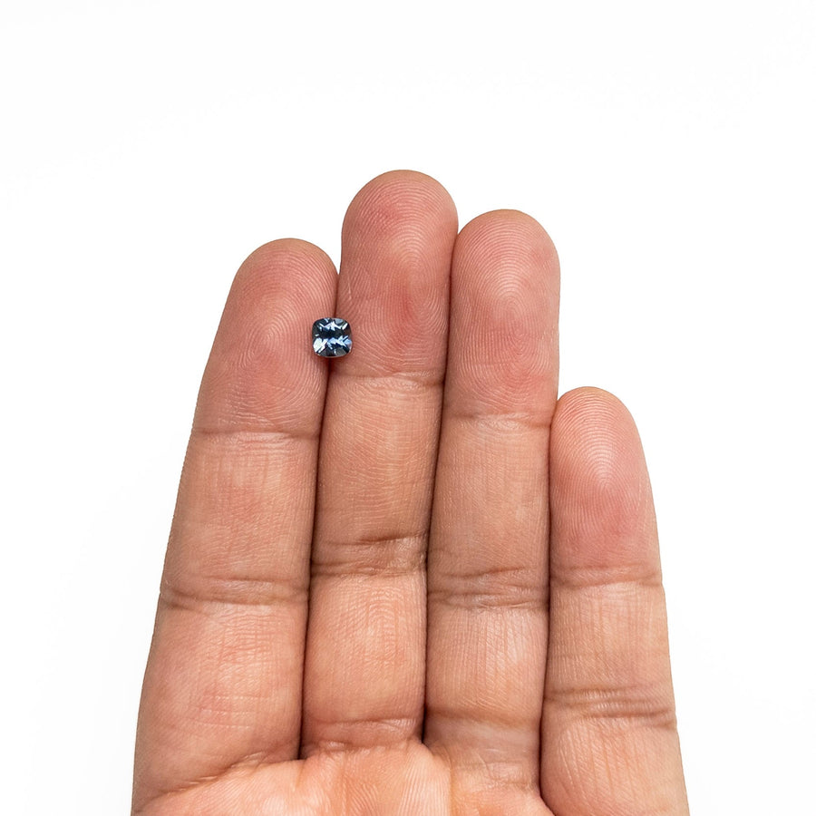 The 0.76ct 5.15x5.08x3.41mm Cushion Brilliant Sapphire 23466-19 by East London jeweller Rachel Boston | Discover our collections of unique and timeless engagement rings, wedding rings, and modern fine jewellery. - Rachel Boston Jewellery