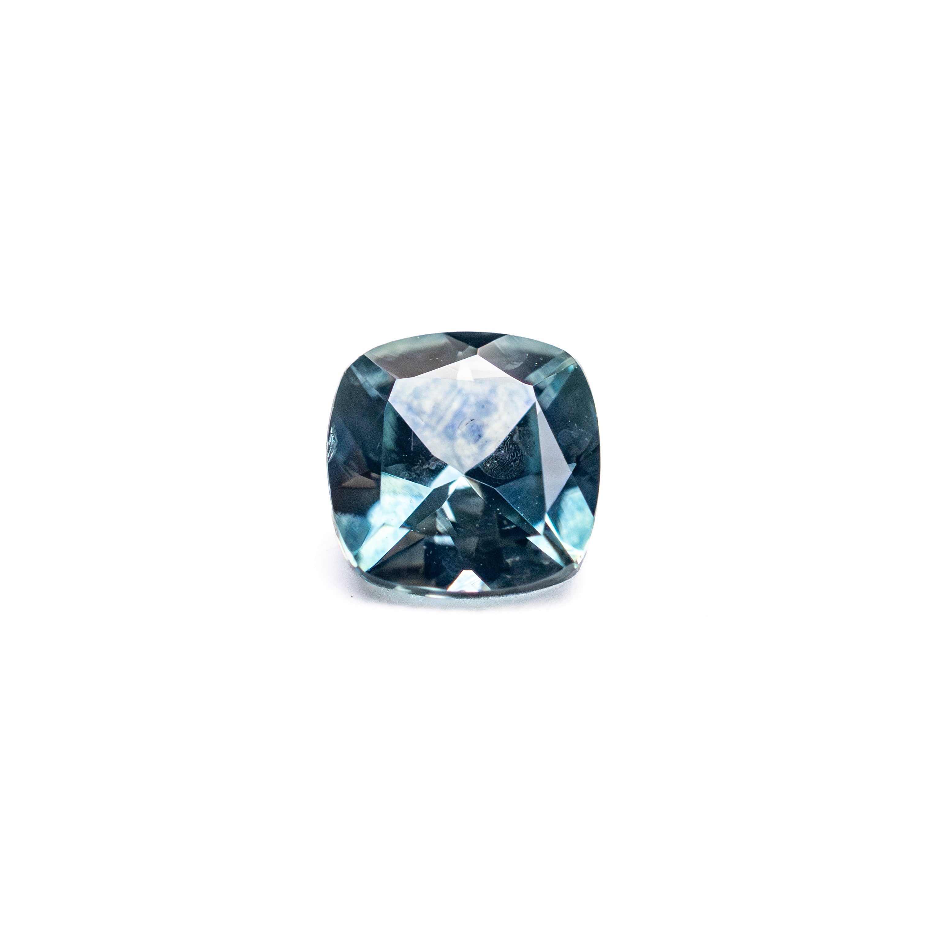 The 0.68ct 5.06x4.99x3.05mm Cushion Brilliant Sapphire 23466-20 by East London jeweller Rachel Boston | Discover our collections of unique and timeless engagement rings, wedding rings, and modern fine jewellery.