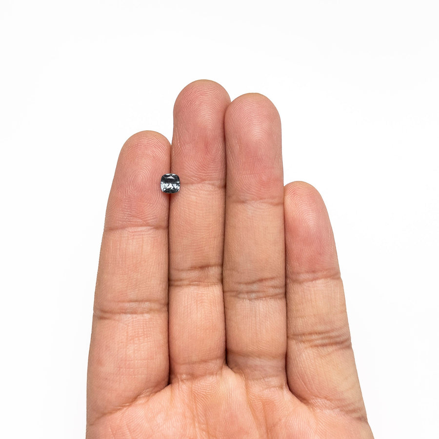 The 0.68ct 5.06x4.99x3.05mm Cushion Brilliant Sapphire 23466-20 by East London jeweller Rachel Boston | Discover our collections of unique and timeless engagement rings, wedding rings, and modern fine jewellery. - Rachel Boston Jewellery