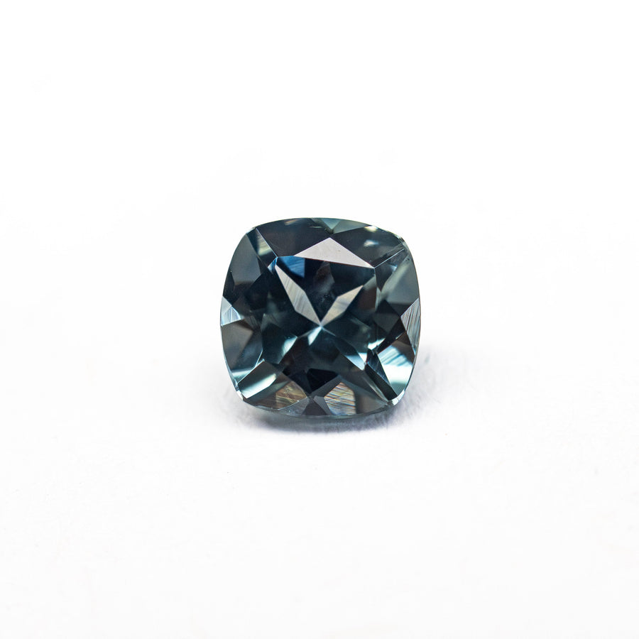 The 0.81ct 5.09x5.08x3.56mm Cushion Brilliant Sapphire 23466-21 by East London jeweller Rachel Boston | Discover our collections of unique and timeless engagement rings, wedding rings, and modern fine jewellery. - Rachel Boston Jewellery