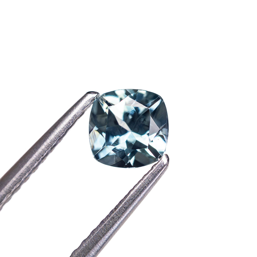 The 0.81ct 5.09x5.08x3.56mm Cushion Brilliant Sapphire 23466-21 by East London jeweller Rachel Boston | Discover our collections of unique and timeless engagement rings, wedding rings, and modern fine jewellery. - Rachel Boston Jewellery