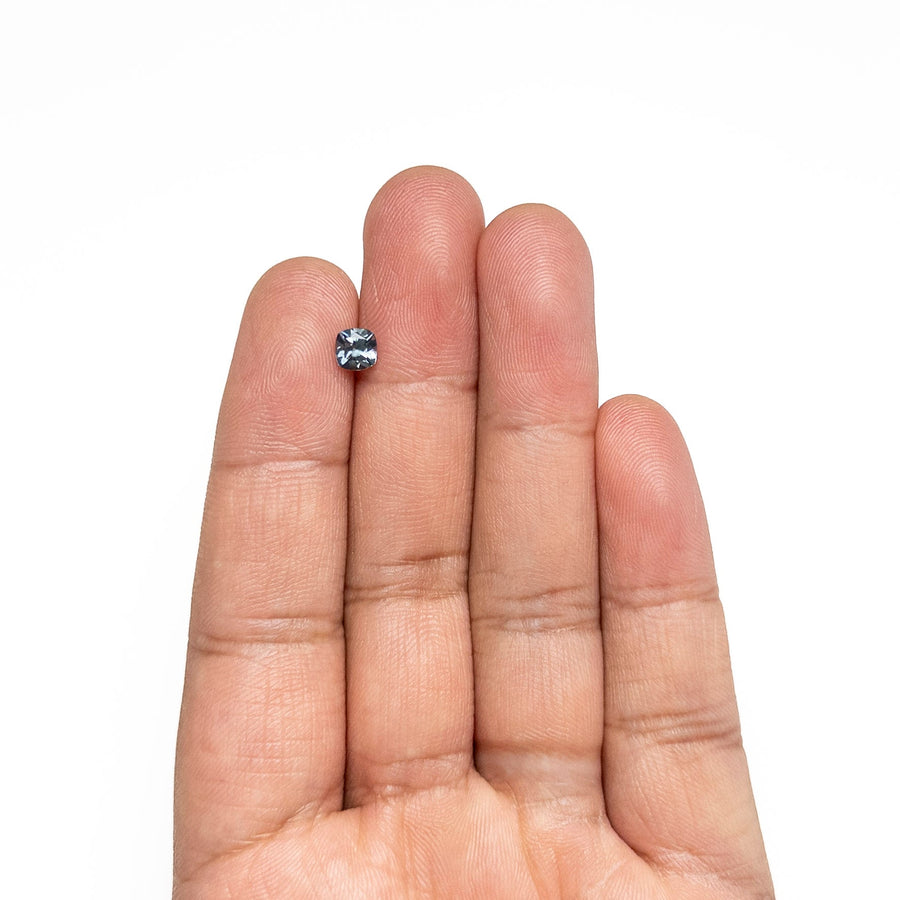 The 0.81ct 5.09x5.08x3.56mm Cushion Brilliant Sapphire 23466-21 by East London jeweller Rachel Boston | Discover our collections of unique and timeless engagement rings, wedding rings, and modern fine jewellery. - Rachel Boston Jewellery