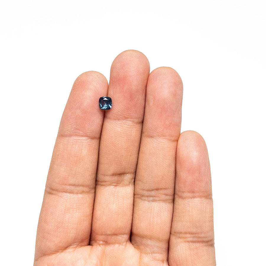 The 0.63ct 5.08x5.07x2.76mm Cushion Brilliant Sapphire 23466-23 by East London jeweller Rachel Boston | Discover our collections of unique and timeless engagement rings, wedding rings, and modern fine jewellery. - Rachel Boston Jewellery
