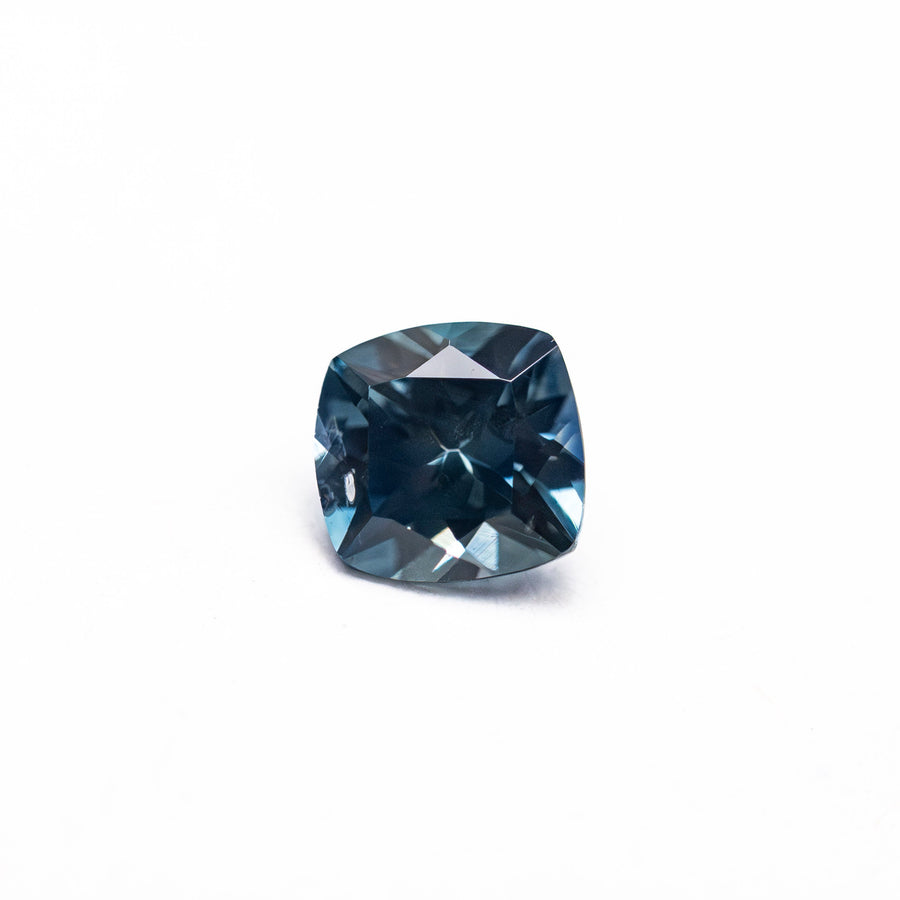 The 0.67ct 5.00x4.88x3.28mm Cushion Brilliant Sapphire 23466-25 by East London jeweller Rachel Boston | Discover our collections of unique and timeless engagement rings, wedding rings, and modern fine jewellery. - Rachel Boston Jewellery