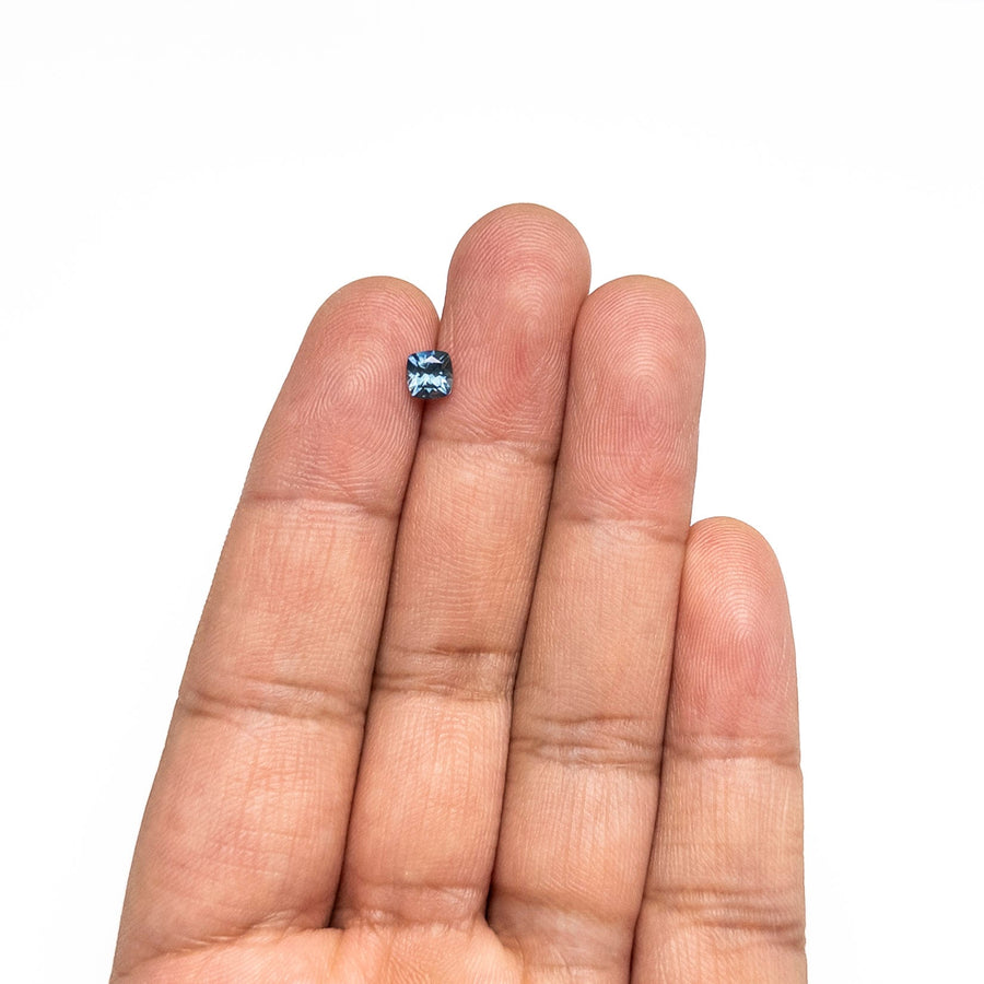 The 0.67ct 5.00x4.88x3.28mm Cushion Brilliant Sapphire 23466-25 by East London jeweller Rachel Boston | Discover our collections of unique and timeless engagement rings, wedding rings, and modern fine jewellery. - Rachel Boston Jewellery
