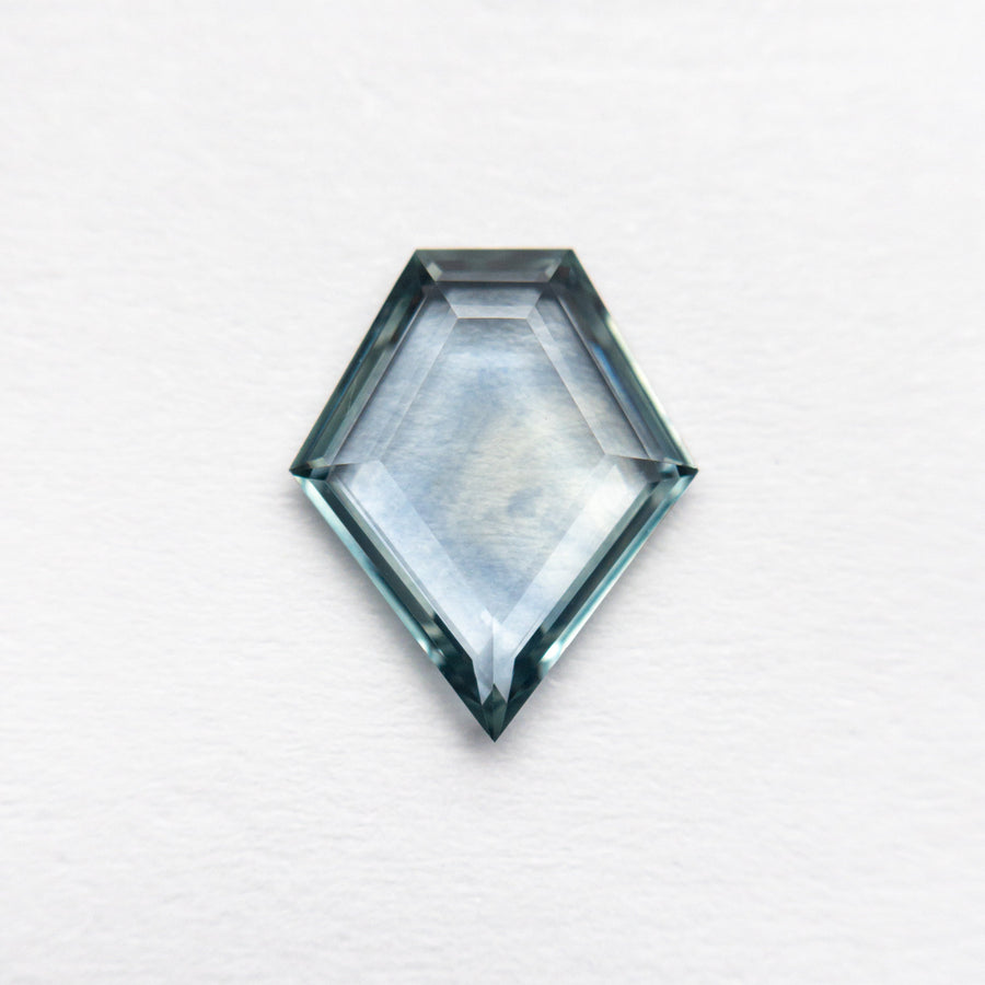 The 1.24ct 9.51x7.88x1.97mm Shield Portrait Cut Sapphire 23474-16 by East London jeweller Rachel Boston | Discover our collections of unique and timeless engagement rings, wedding rings, and modern fine jewellery. - Rachel Boston Jewellery