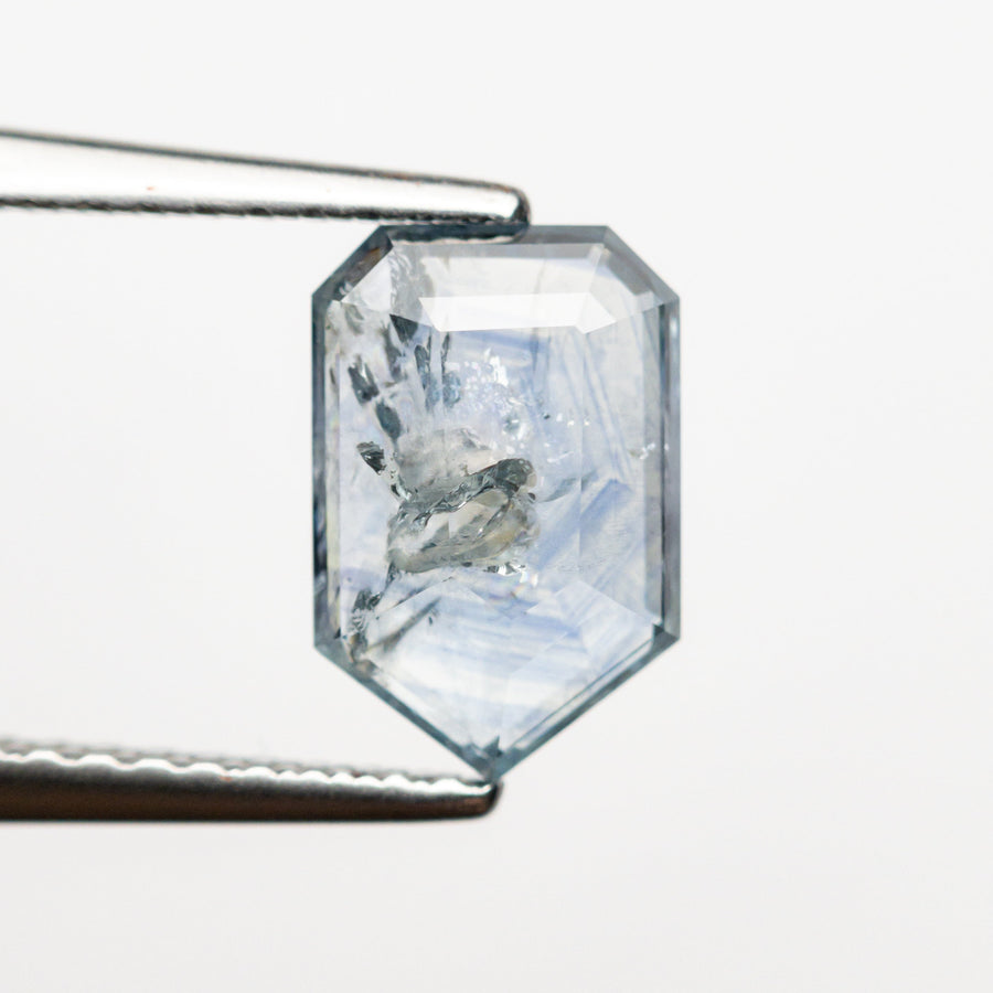 The 1.56ct 8.86x5.85x2.46mm Shield Portrait Cut Sapphire 23474-20 by East London jeweller Rachel Boston | Discover our collections of unique and timeless engagement rings, wedding rings, and modern fine jewellery. - Rachel Boston Jewellery