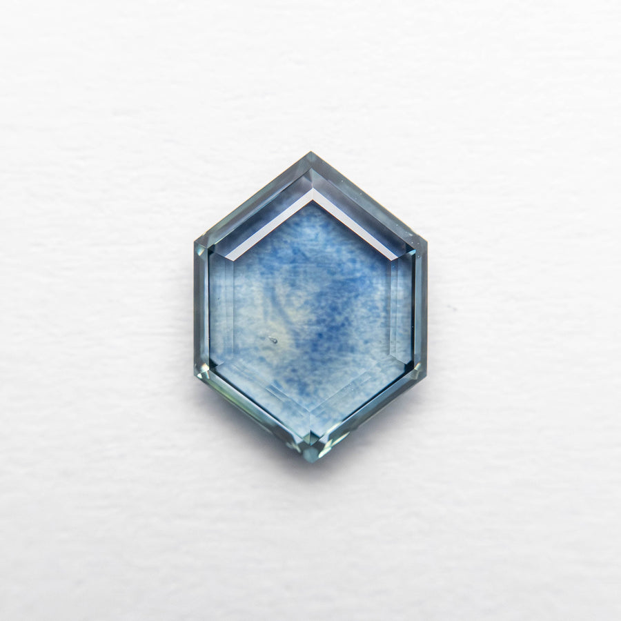 The 1.12ct 8.06x6.02x2.09mm Hexagon Portrait Cut Sapphire 23474-38 by East London jeweller Rachel Boston | Discover our collections of unique and timeless engagement rings, wedding rings, and modern fine jewellery. - Rachel Boston Jewellery
