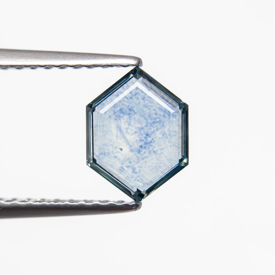 The 1.12ct 8.06x6.02x2.09mm Hexagon Portrait Cut Sapphire 23474-38 by East London jeweller Rachel Boston | Discover our collections of unique and timeless engagement rings, wedding rings, and modern fine jewellery. - Rachel Boston Jewellery