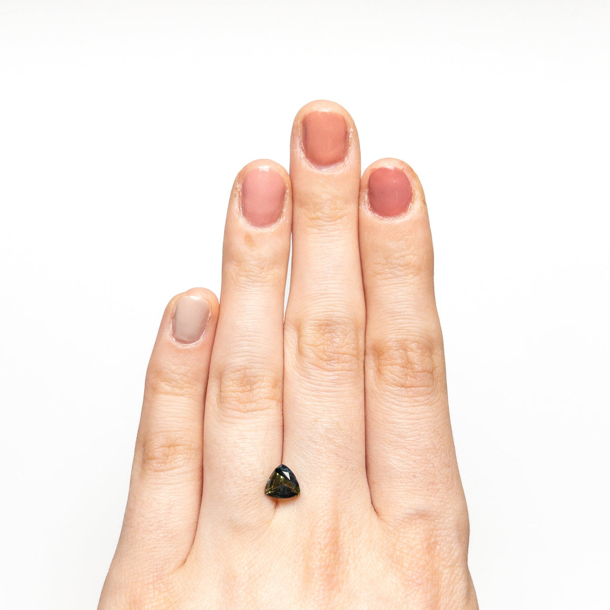 The 1.32ct 6.62x6.50x4.04mm Trillion Brilliant Sapphire 23515-01 by East London jeweller Rachel Boston | Discover our collections of unique and timeless engagement rings, wedding rings, and modern fine jewellery.