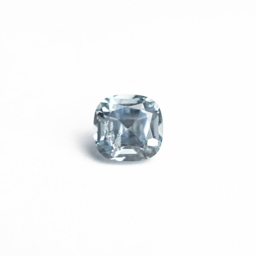The 0.92ct 5.38x5.18x3.82mm Cushion Brilliant Sapphire 23674-15 by East London jeweller Rachel Boston | Discover our collections of unique and timeless engagement rings, wedding rings, and modern fine jewellery. - Rachel Boston Jewellery