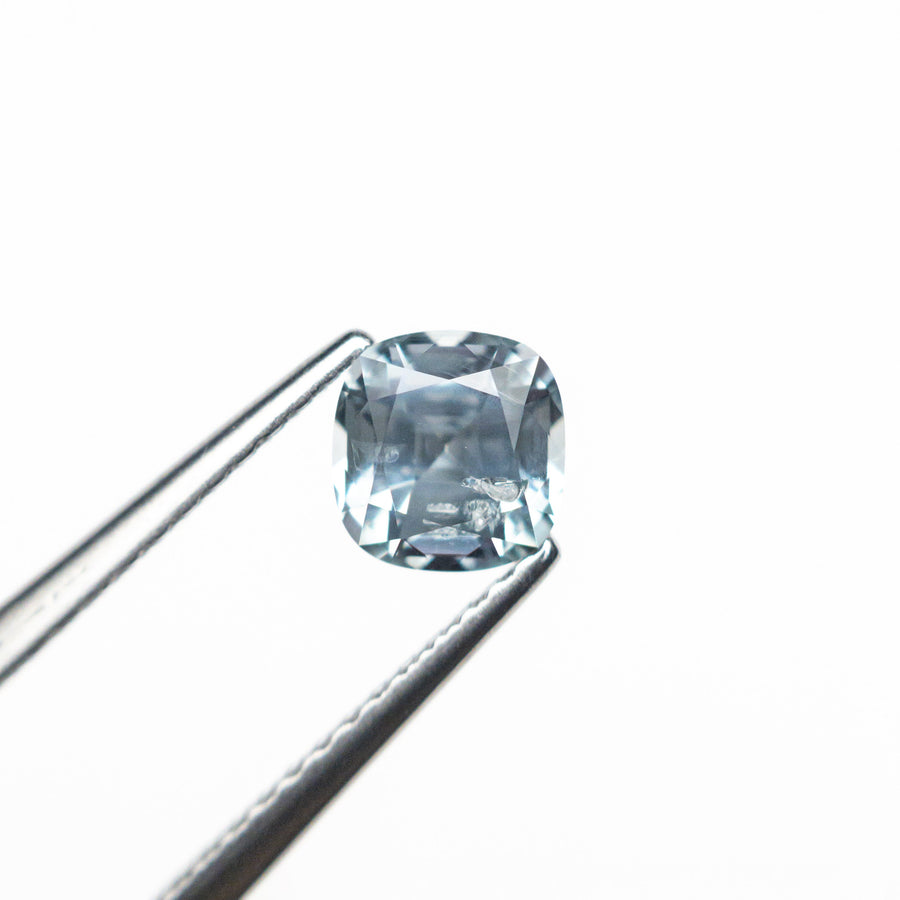 The 0.92ct 5.38x5.18x3.82mm Cushion Brilliant Sapphire 23674-15 by East London jeweller Rachel Boston | Discover our collections of unique and timeless engagement rings, wedding rings, and modern fine jewellery. - Rachel Boston Jewellery