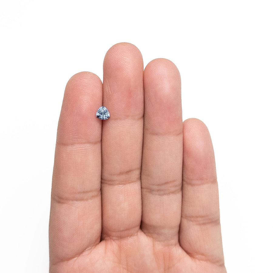 The 0.69ct 4.92x4.99x3.67mm Trillion Brilliant Sapphire 23675-09 by East London jeweller Rachel Boston | Discover our collections of unique and timeless engagement rings, wedding rings, and modern fine jewellery. - Rachel Boston Jewellery