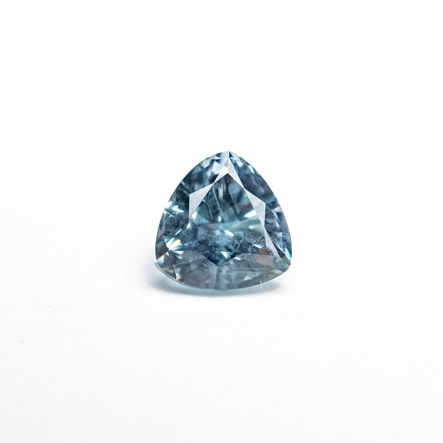 The 0.69ct 4.92x4.99x3.67mm Trillion Brilliant Sapphire 23675-09 by East London jeweller Rachel Boston | Discover our collections of unique and timeless engagement rings, wedding rings, and modern fine jewellery. - Rachel Boston Jewellery