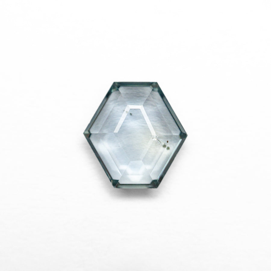 The 1.08ct 6.68x6.55x2.45mm Hexagon Portrait Cut Sapphire 23677-04 by East London jeweller Rachel Boston | Discover our collections of unique and timeless engagement rings, wedding rings, and modern fine jewellery. - Rachel Boston Jewellery