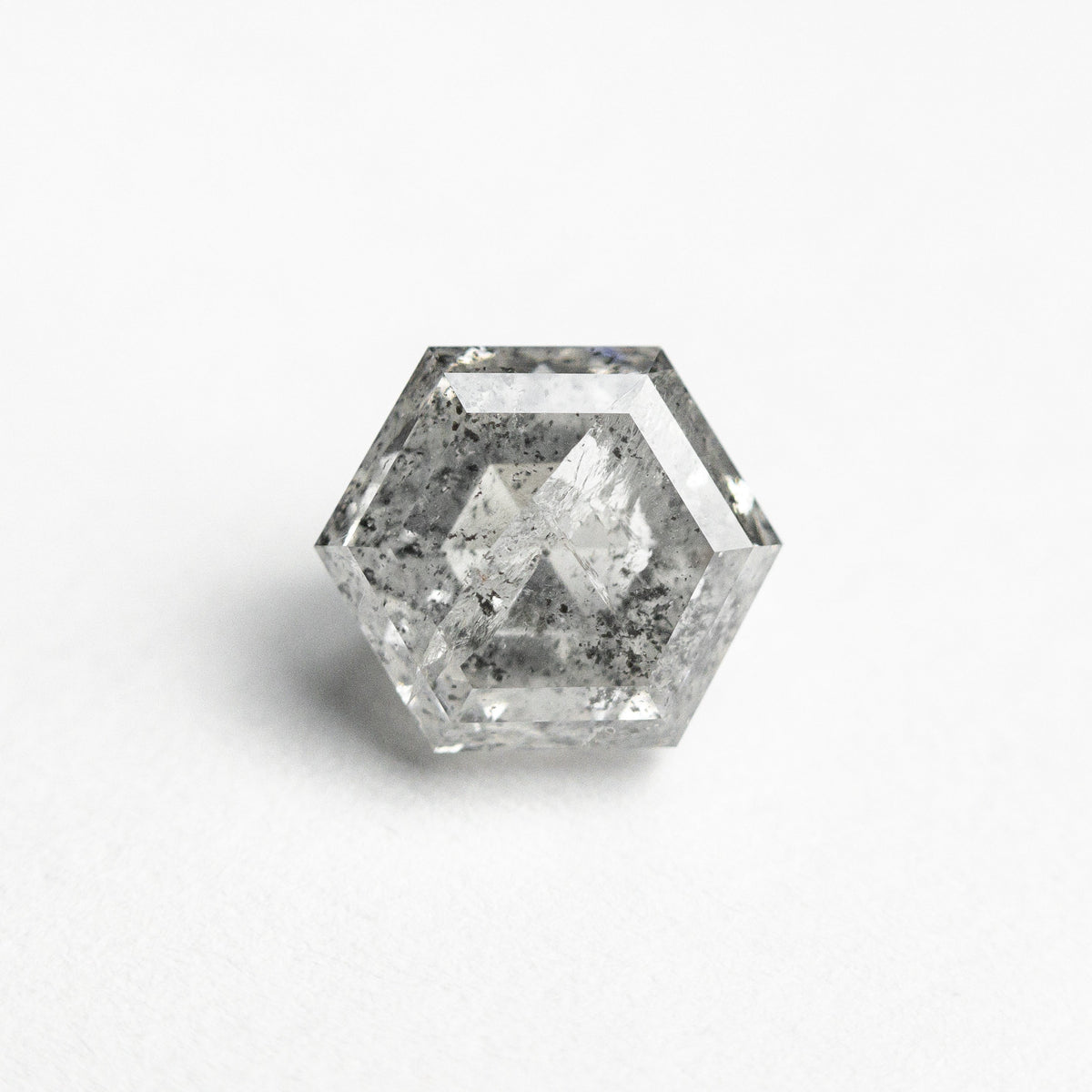 The 1.62ct 7.05x6.10x4.46mm Hexagon Step Cut 🇨🇦 23969-01 by East London jeweller Rachel Boston | Discover our collections of unique and timeless engagement rings, wedding rings, and modern fine jewellery.