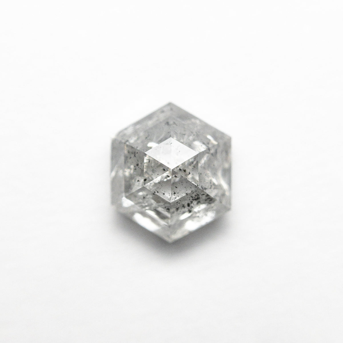 The 1.62ct 7.05x6.10x4.46mm Hexagon Step Cut 🇨🇦 23969-01 by East London jeweller Rachel Boston | Discover our collections of unique and timeless engagement rings, wedding rings, and modern fine jewellery.