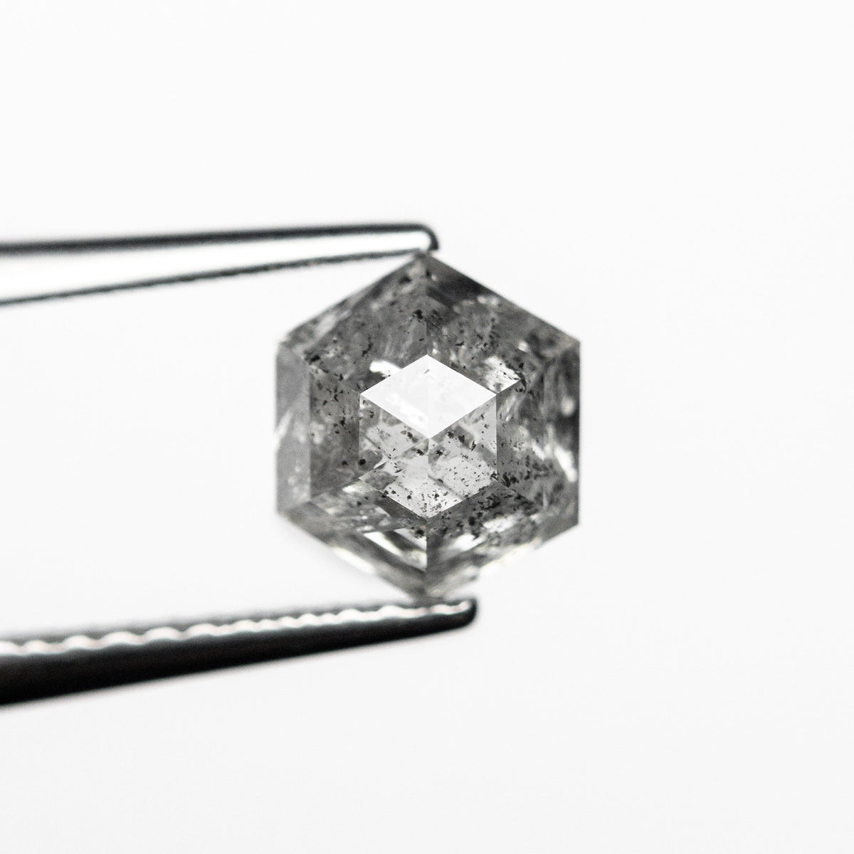 The 1.62ct 7.05x6.10x4.46mm Hexagon Step Cut 🇨🇦 23969-01 by East London jeweller Rachel Boston | Discover our collections of unique and timeless engagement rings, wedding rings, and modern fine jewellery.
