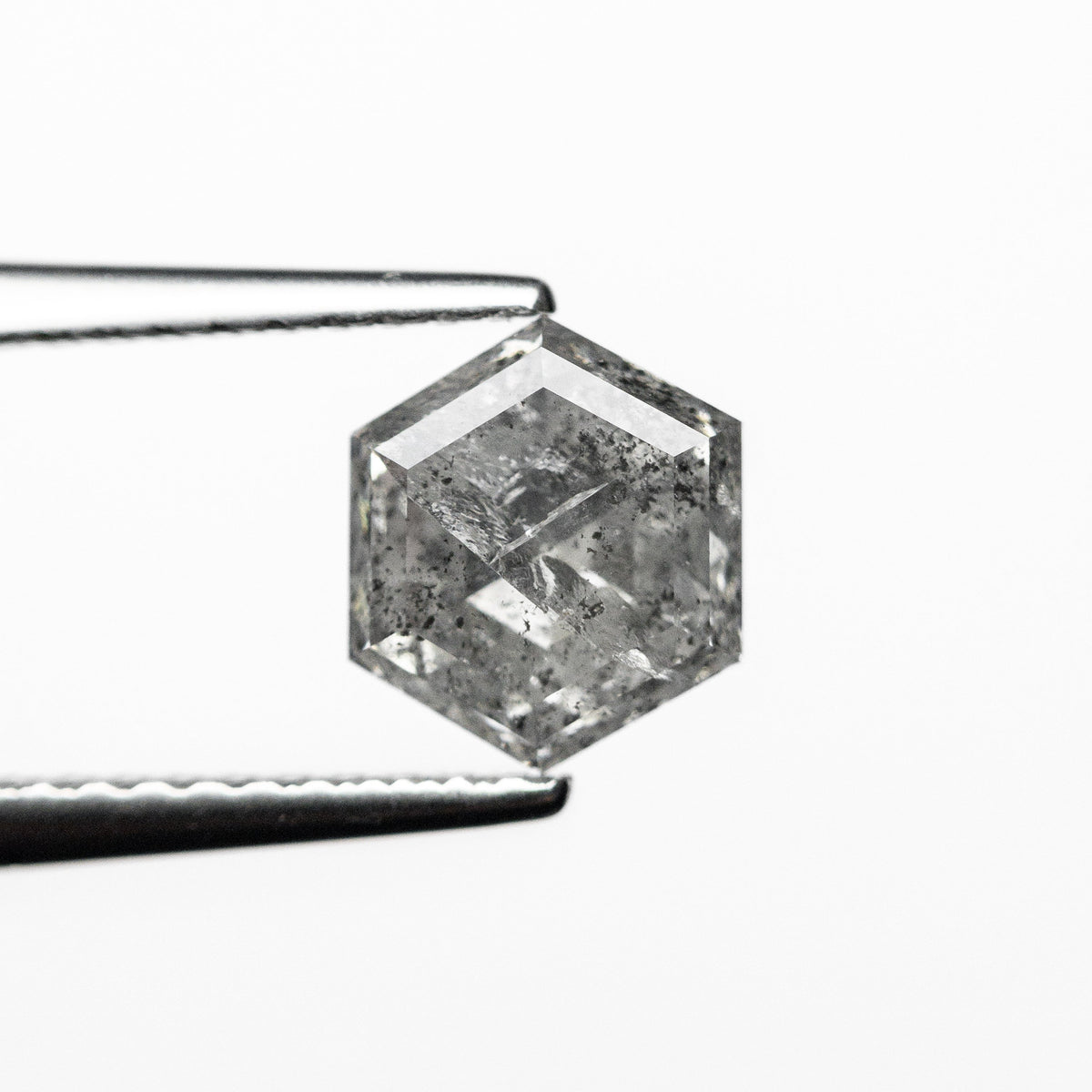 The 1.62ct 7.05x6.10x4.46mm Hexagon Step Cut 🇨🇦 23969-01 by East London jeweller Rachel Boston | Discover our collections of unique and timeless engagement rings, wedding rings, and modern fine jewellery.