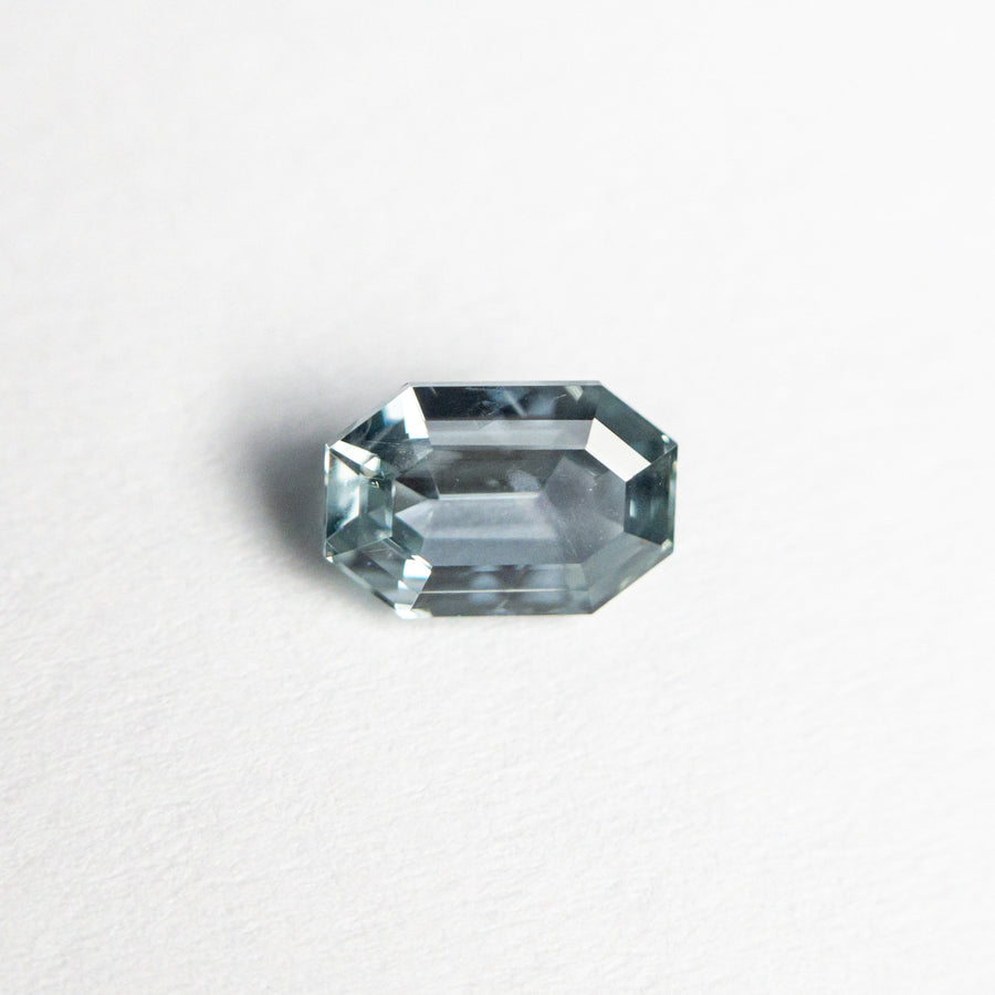 The 0.64ct 5.83x3.94x2.65mm Cut Corner Rectangle Step Cut Sapphire 23705-06 by East London jeweller Rachel Boston | Discover our collections of unique and timeless engagement rings, wedding rings, and modern fine jewellery. - Rachel Boston Jewellery