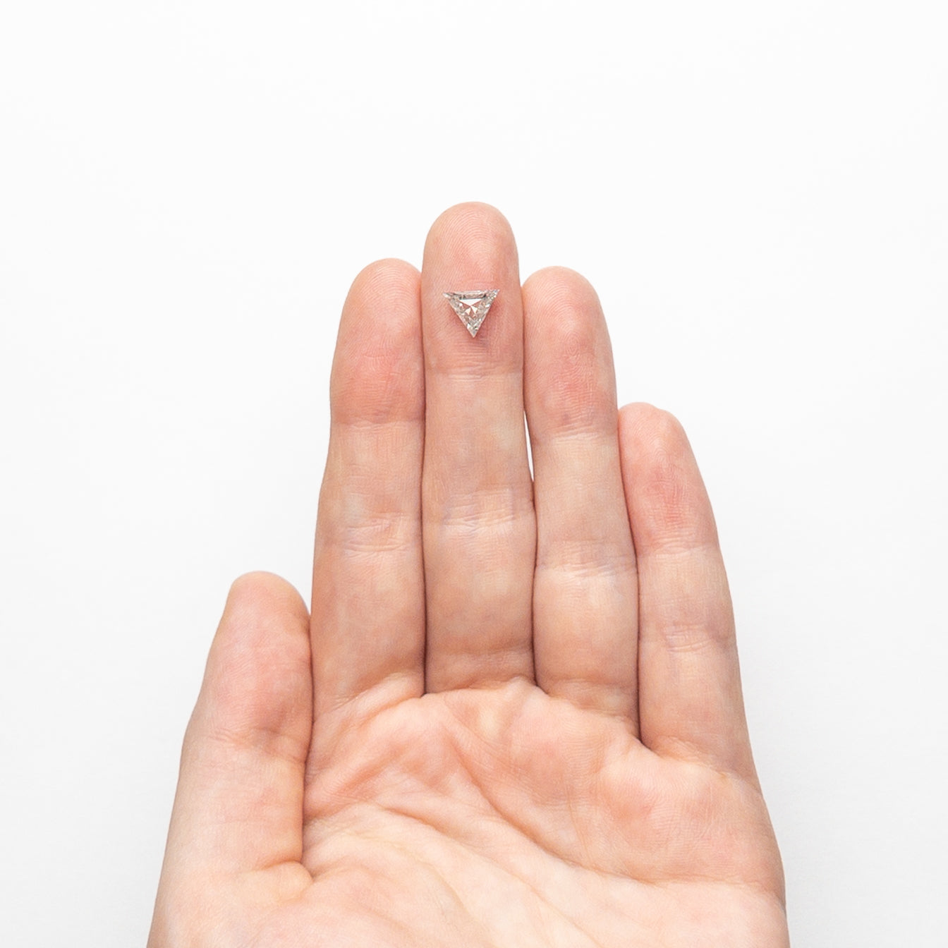The 1.09ct 6.79x7.69x3.55mm Triangle Step Cut 23840-37 by East London jeweller Rachel Boston | Discover our collections of unique and timeless engagement rings, wedding rings, and modern fine jewellery.