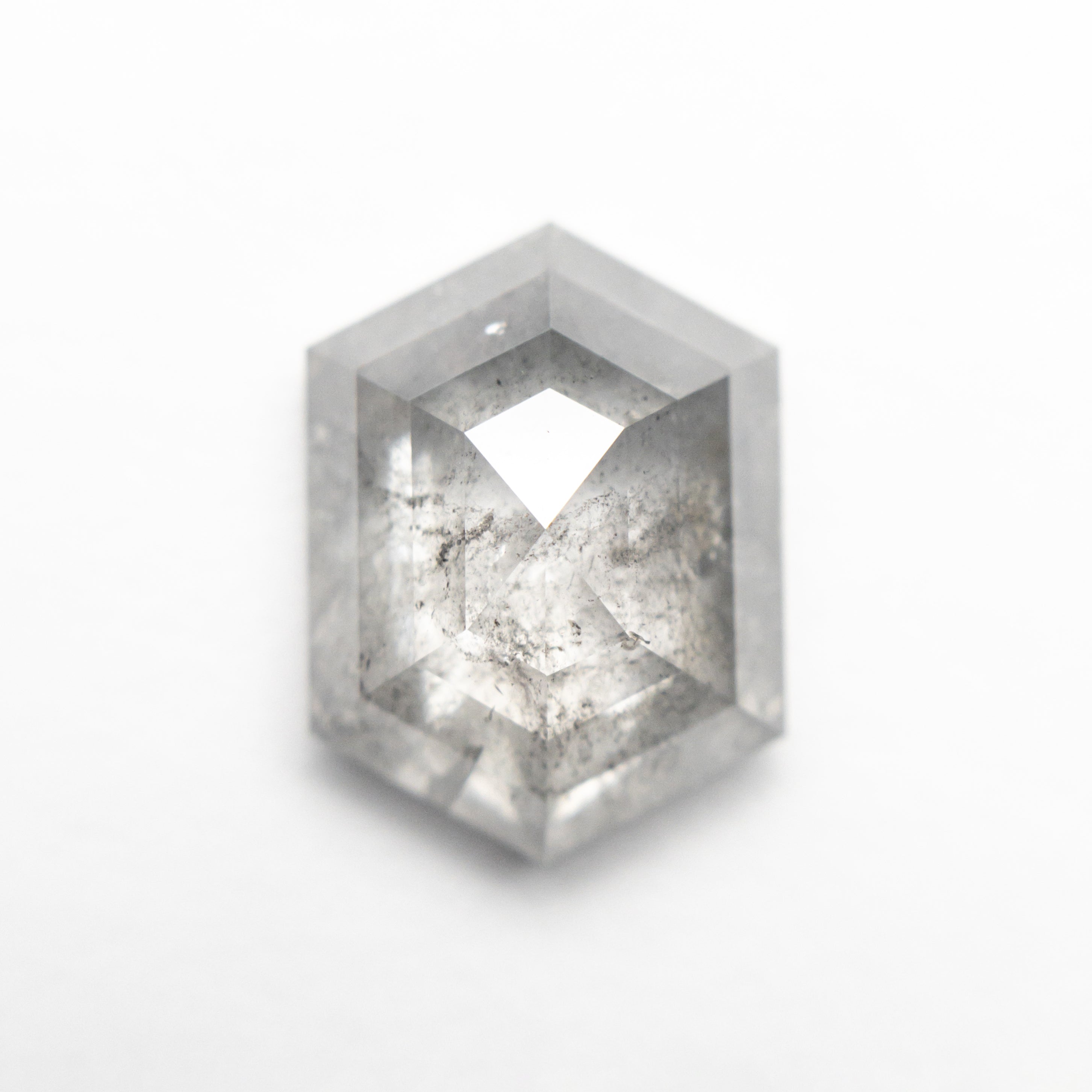 The 3.75ct 11.28x8.38x4.62mm Hexagon Step Cut 23841-07 by East London jeweller Rachel Boston | Discover our collections of unique and timeless engagement rings, wedding rings, and modern fine jewellery.